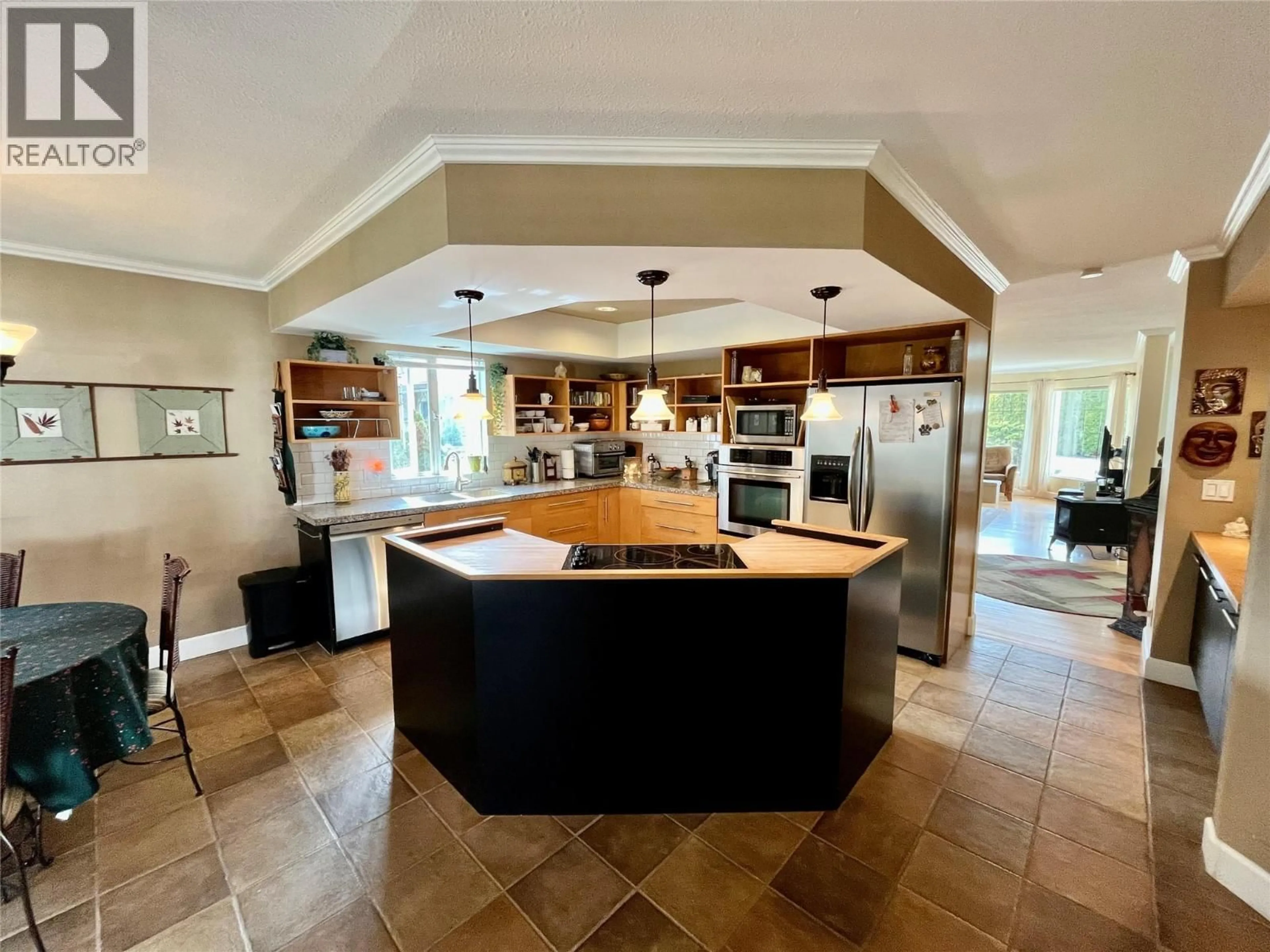 Open concept kitchen, ceramic/tile floor for 421 OAK AVENUE, Sicamous British Columbia V0E2V1