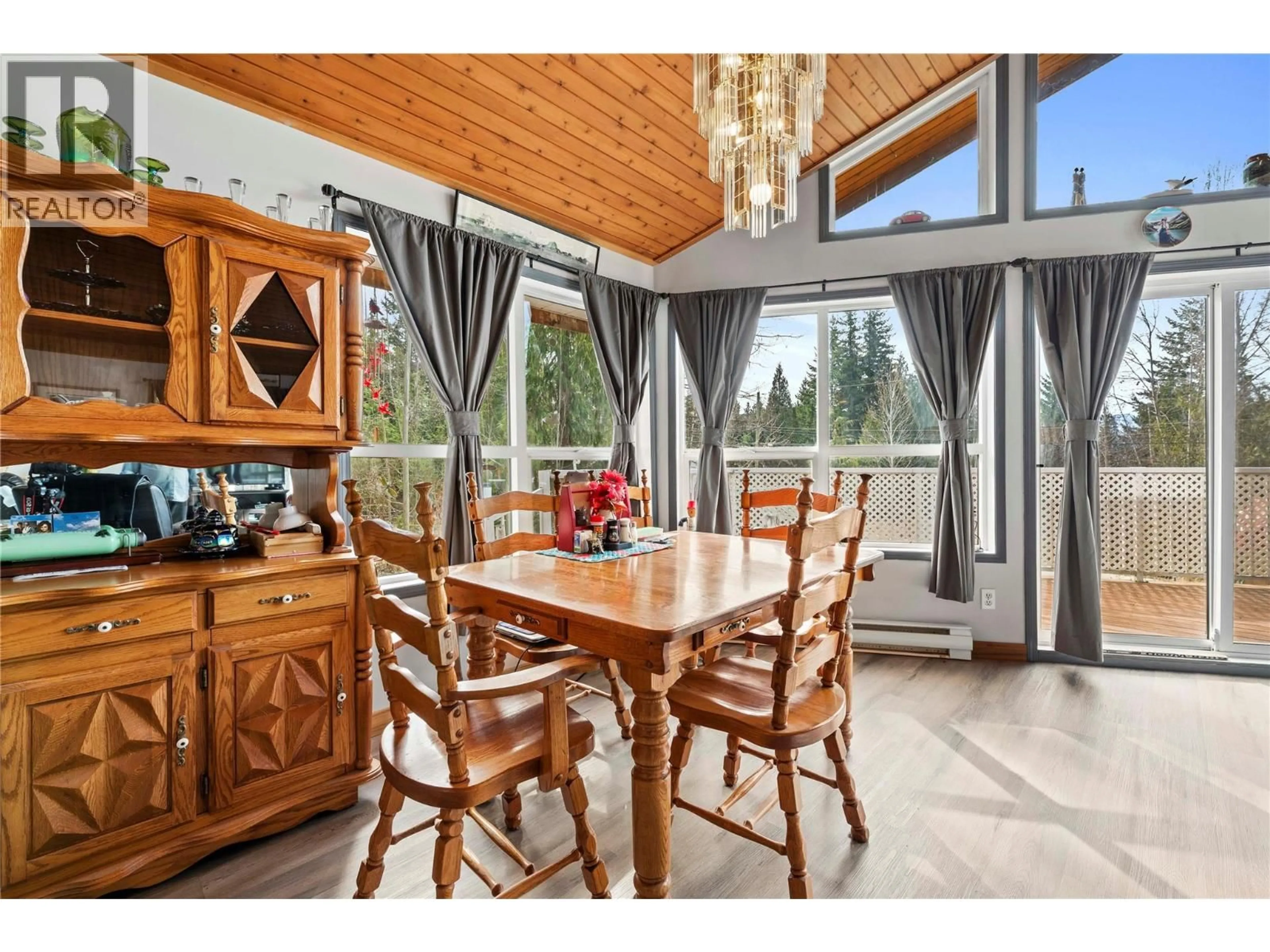 Dining room, wood/laminate floor for 7241 ESTATE PLACE, Anglemont British Columbia V0E1M8