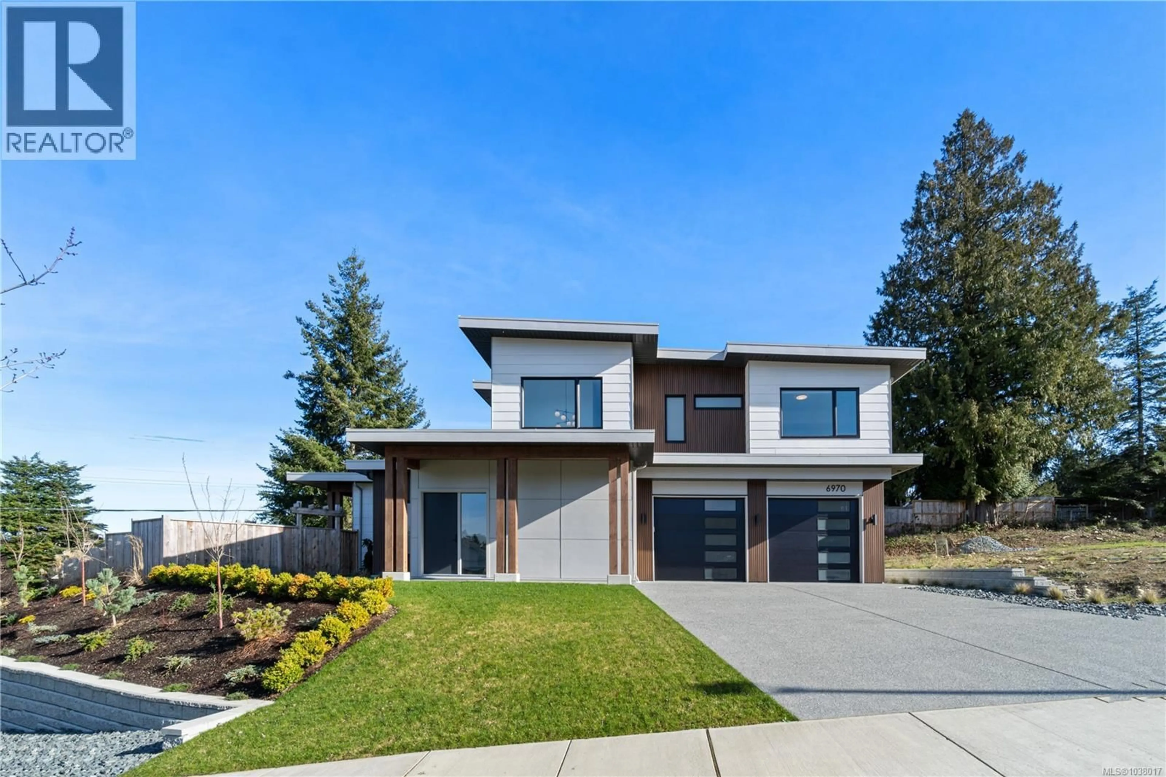 Home with brick exterior material, street for 6970 SHALE ROAD, Lantzville British Columbia V0R2H0