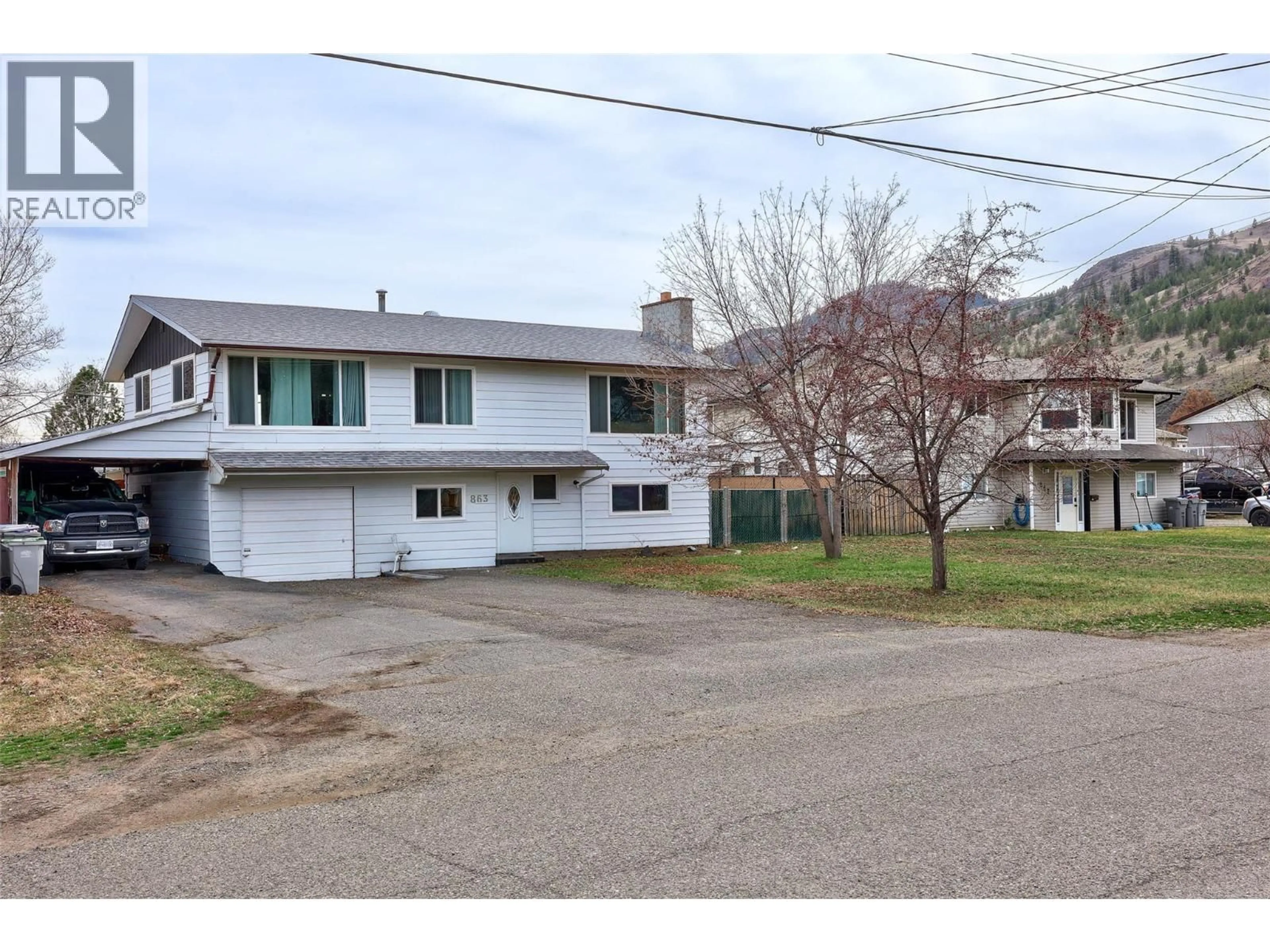 A pic from outside/outdoor area/front of a property/back of a property/a pic from drone, street for 863 DEVER DRIVE, Kamloops British Columbia V2B6P9