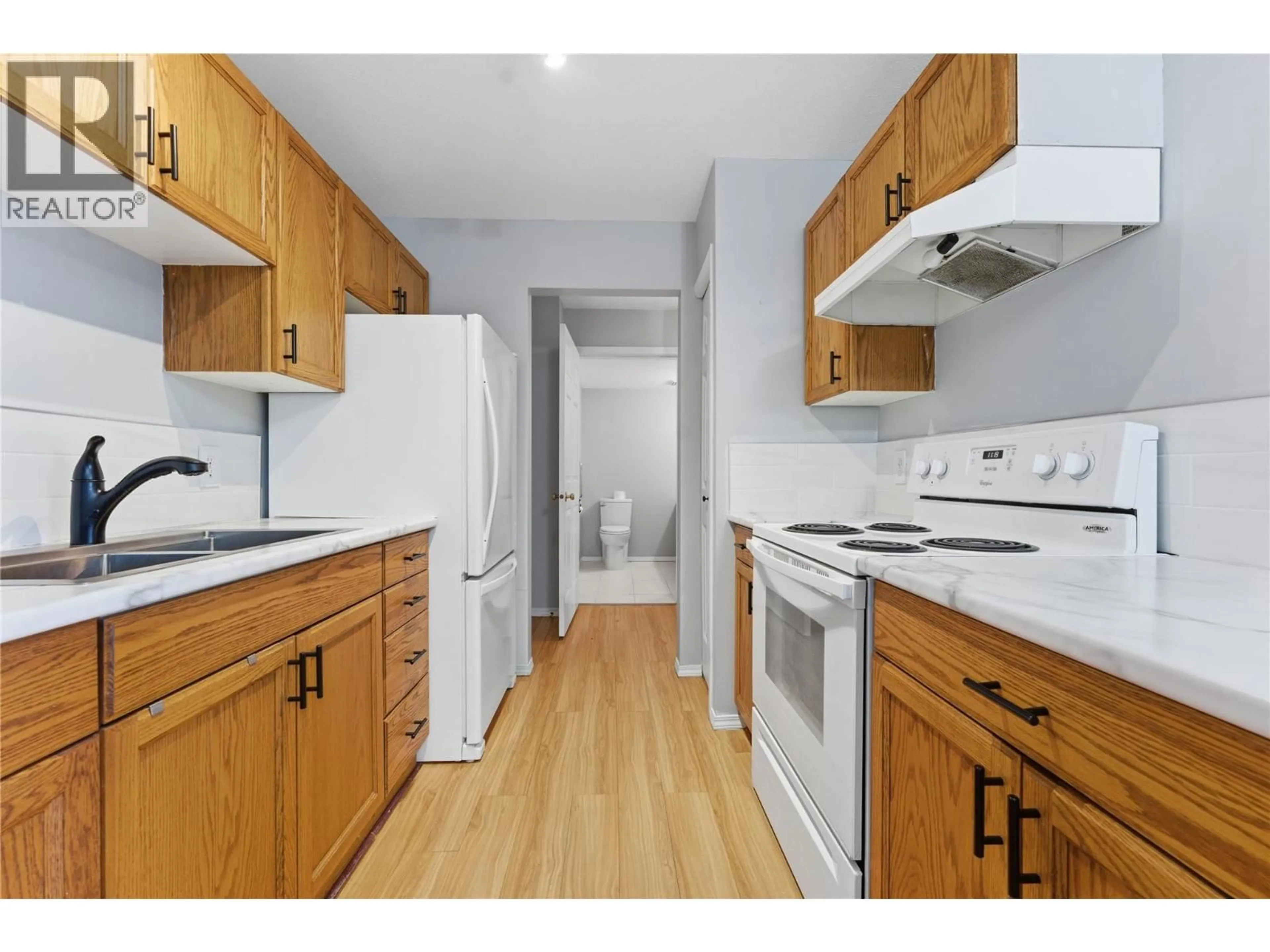 Standard kitchen, wood/laminate floor for 102 - 703 GRANVILLE AVENUE, Enderby British Columbia V4Y6A4