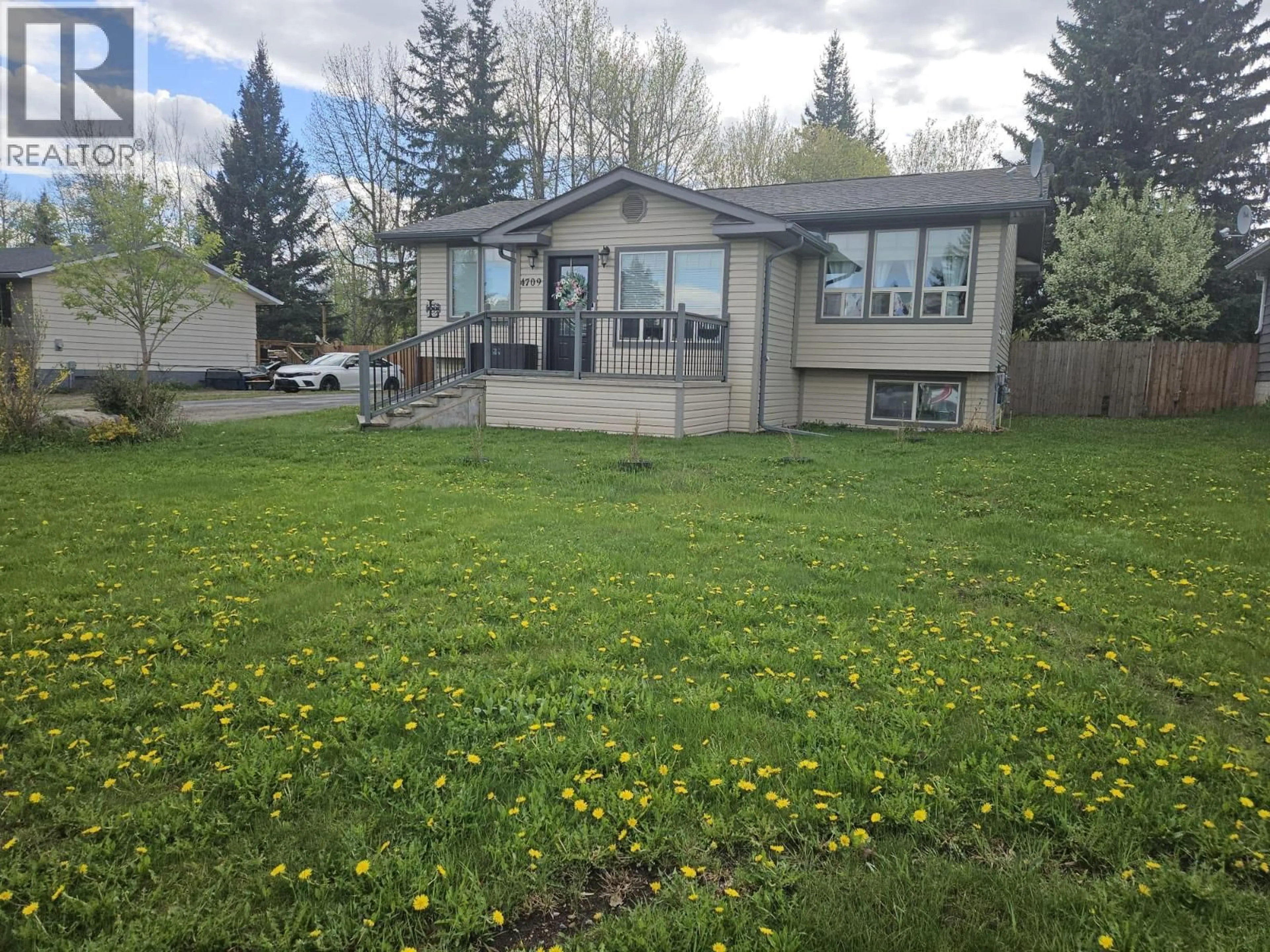 A pic from outside/outdoor area/front of a property/back of a property/a pic from drone, unknown for 4709 45 STREET NORTHEAST, Chetwynd British Columbia V0C1J0