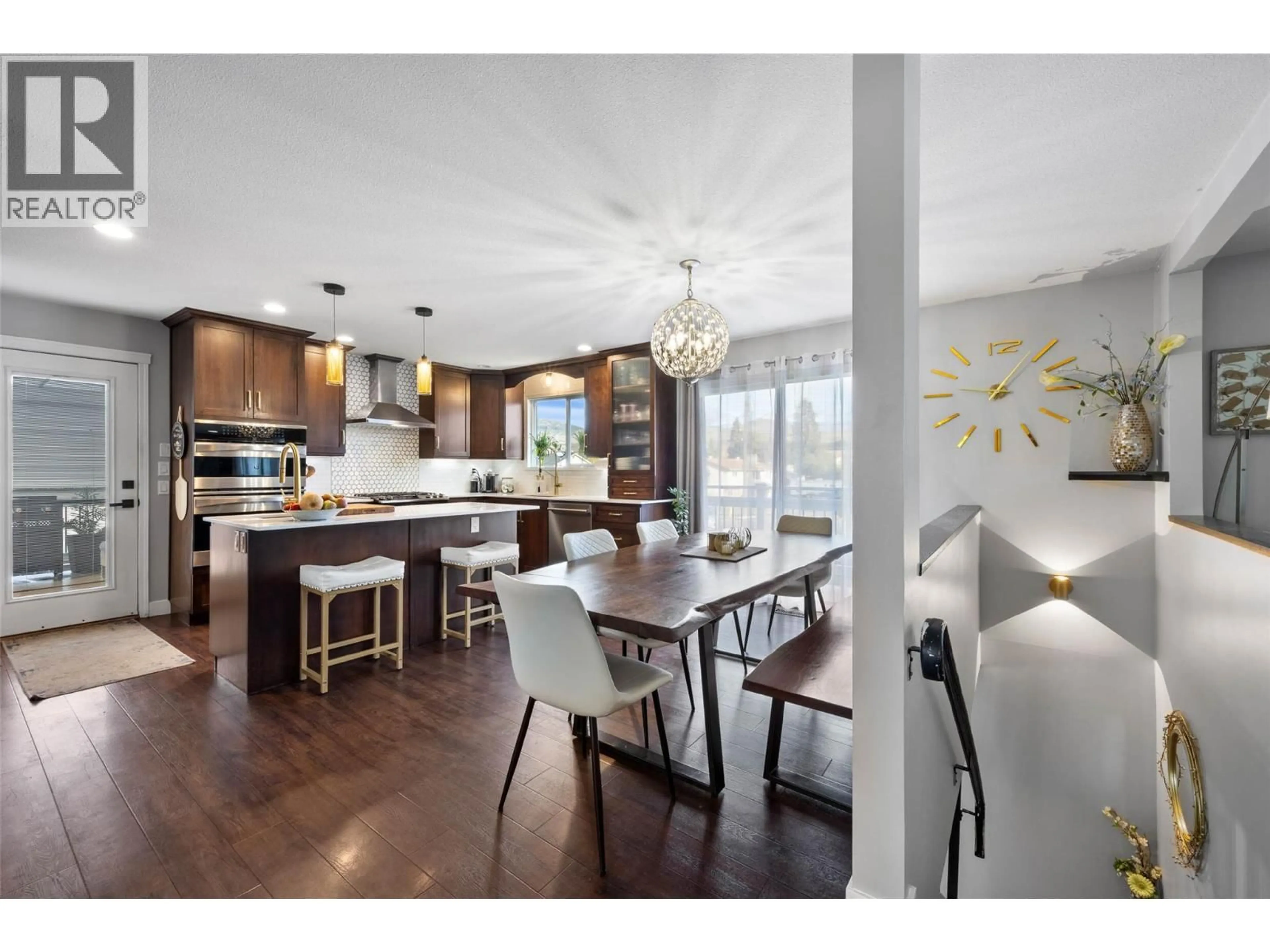 Open concept kitchen, wood/laminate floor for 1795 DELNOR CRESCENT, Kamloops British Columbia V2B4H9