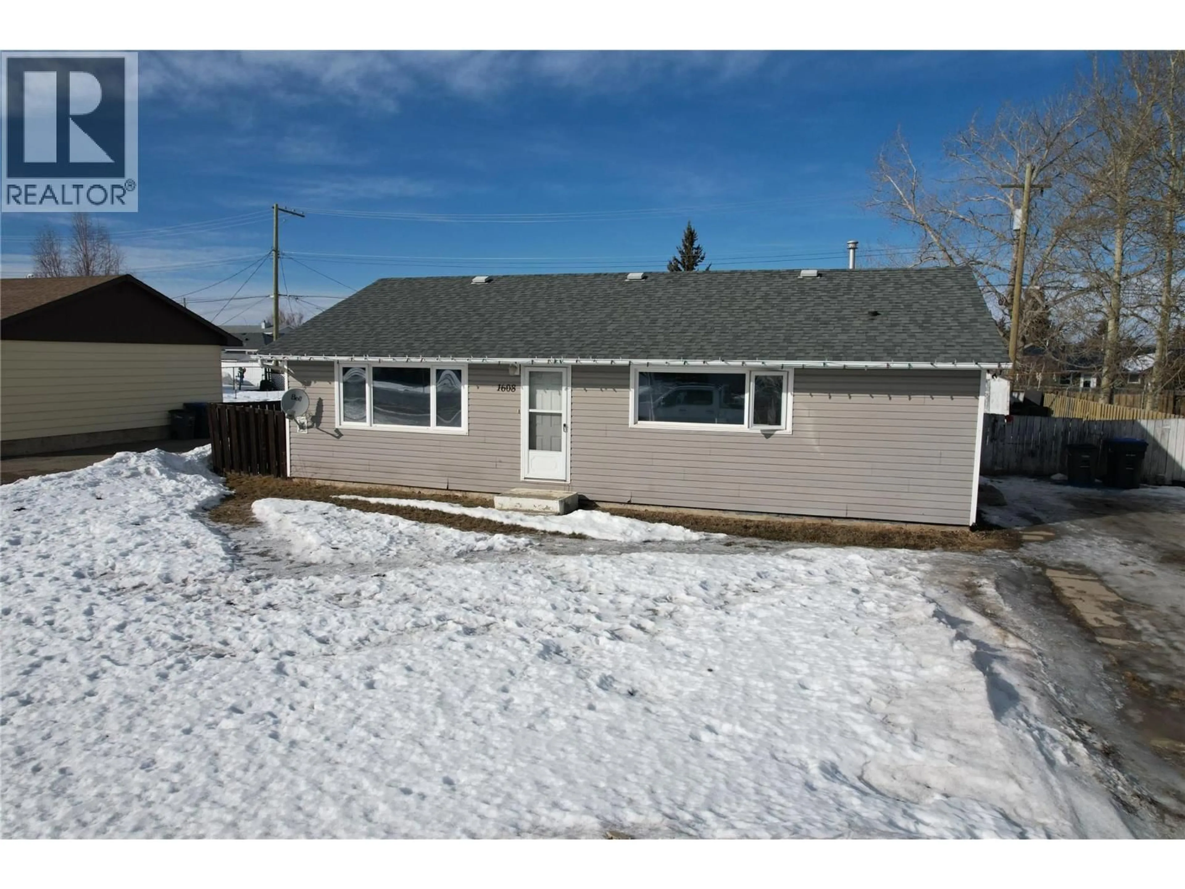 Home with vinyl exterior material, street for 1608 116 AVENUE, Dawson Creek British Columbia V1G3G4
