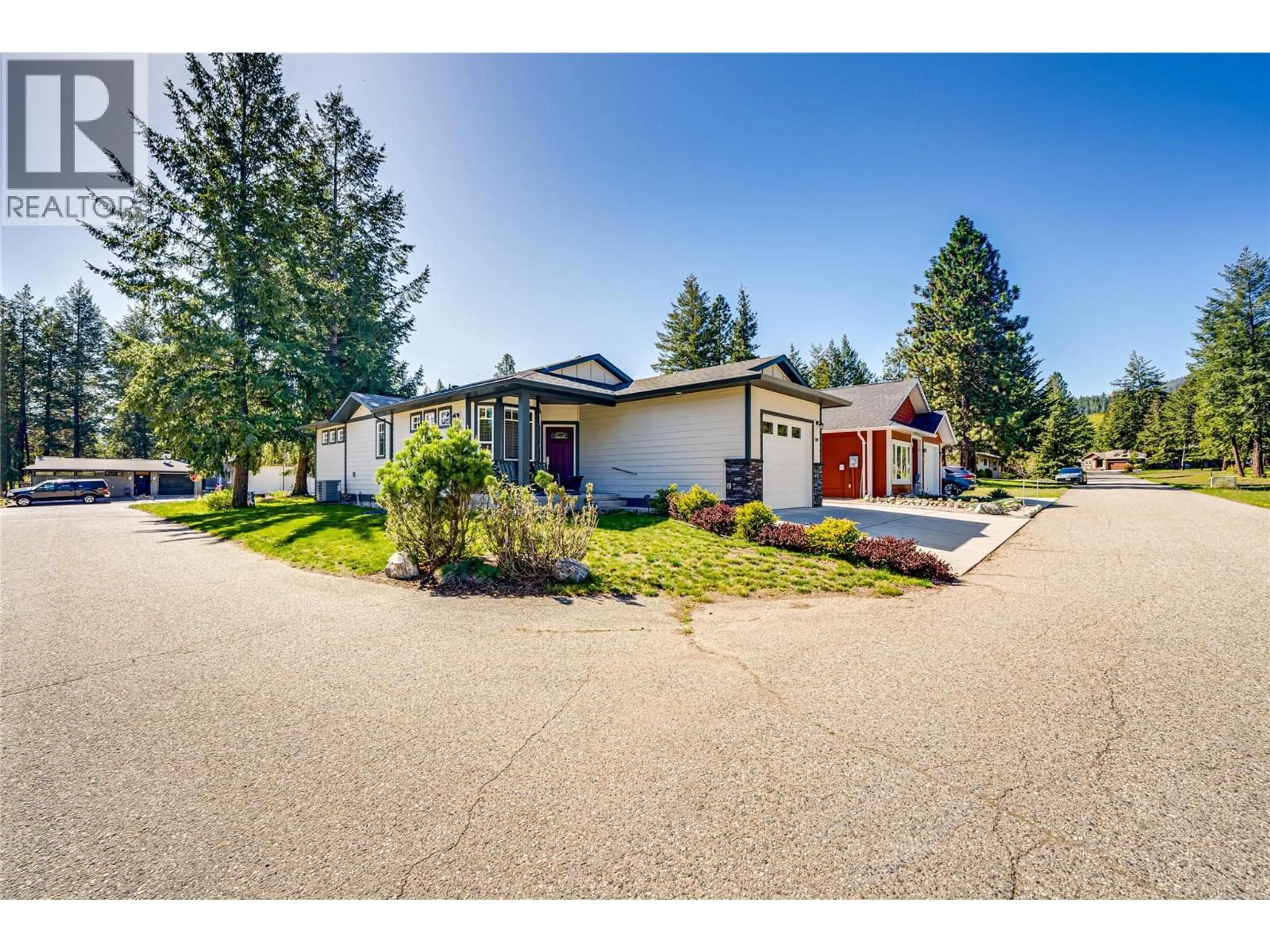 A pic from outside/outdoor area/front of a property/back of a property/a pic from drone, street for 270 GROUSE AVENUE, Vernon British Columbia V1H2A1