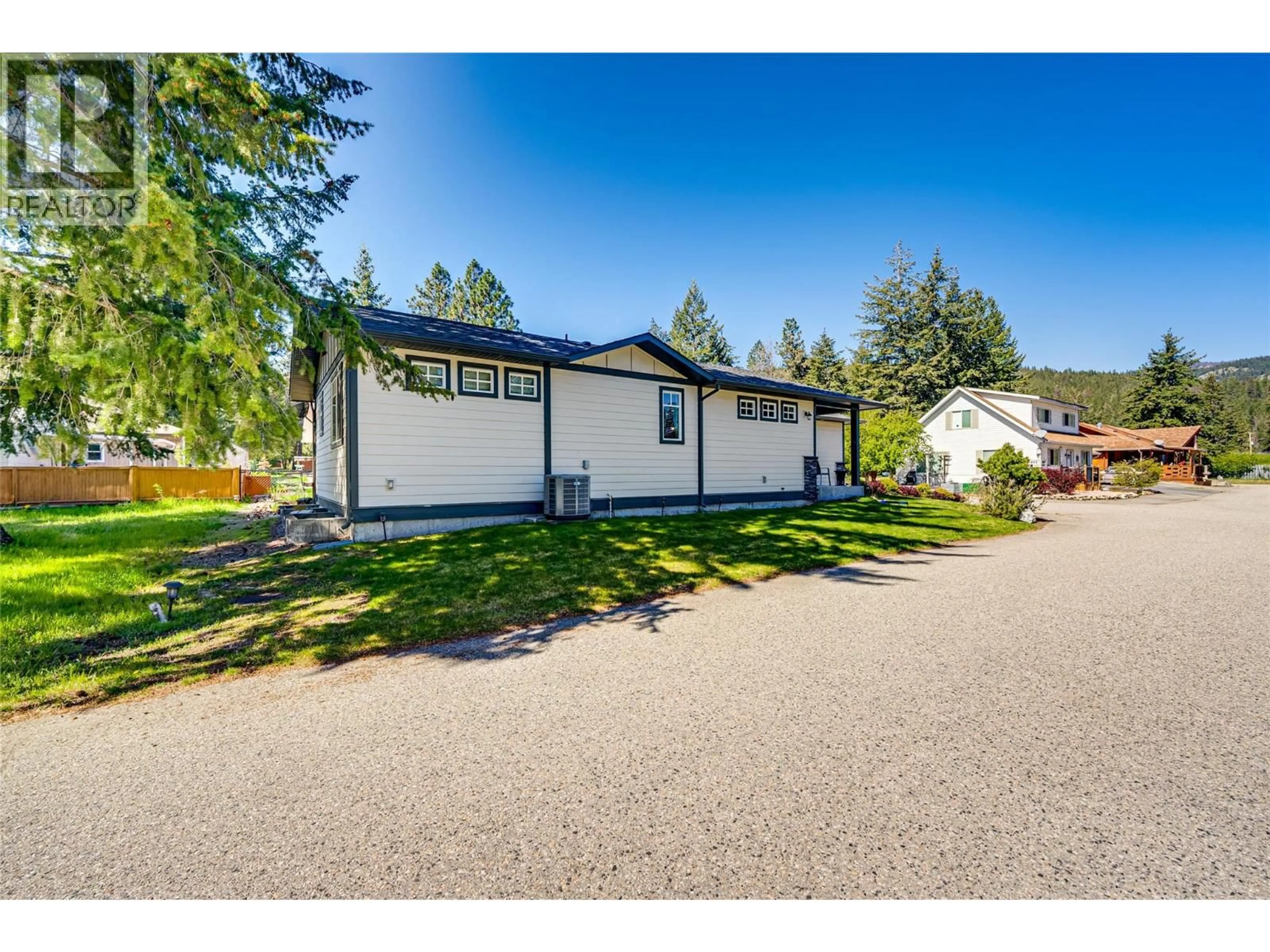A pic from outside/outdoor area/front of a property/back of a property/a pic from drone, street for 270 GROUSE AVENUE, Vernon British Columbia V1H2A1