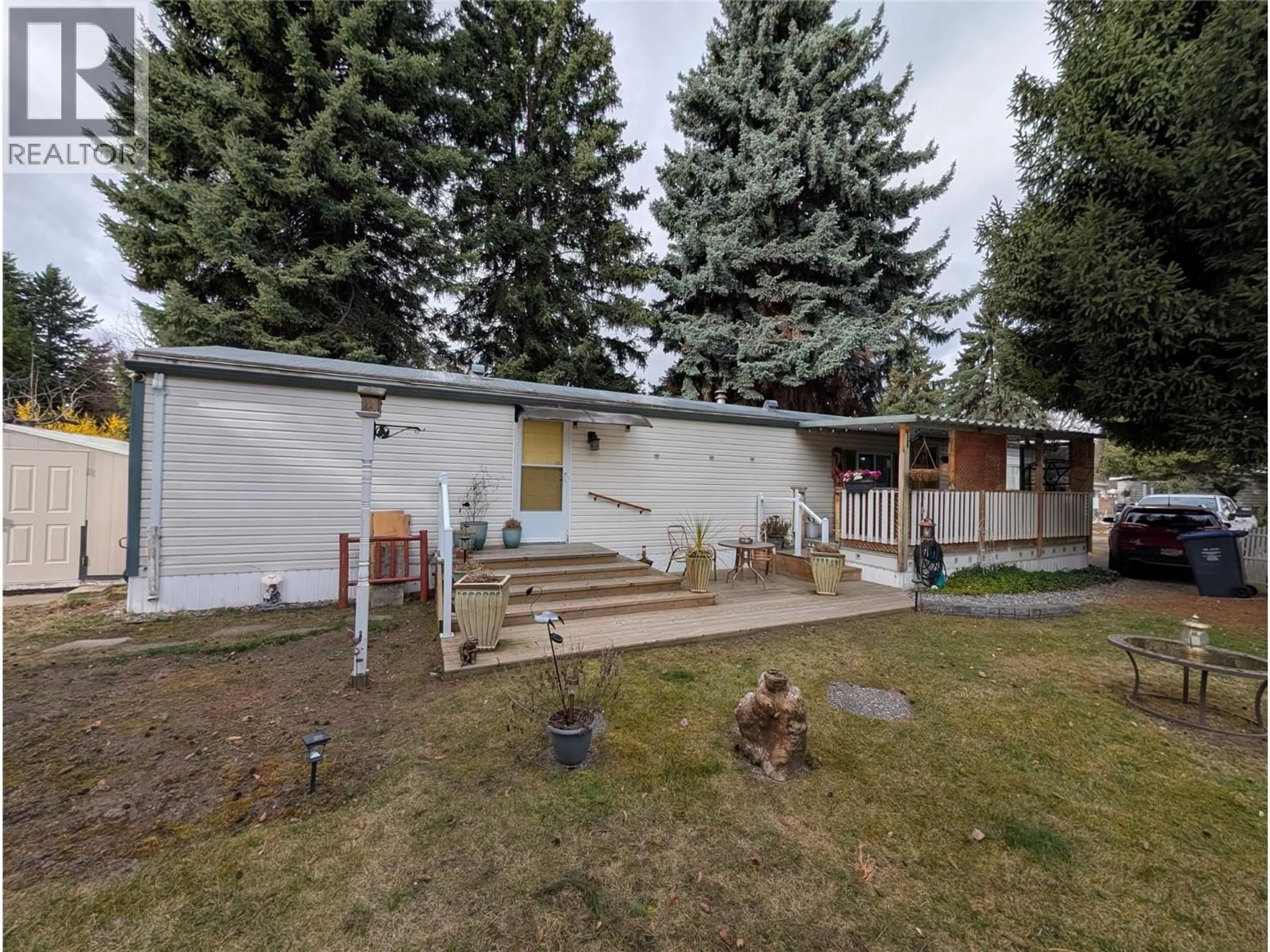 A pic from outside/outdoor area/front of a property/back of a property/a pic from drone, mountain view for 27 - 3535 CASORSO ROAD, Kelowna British Columbia V1W3E1