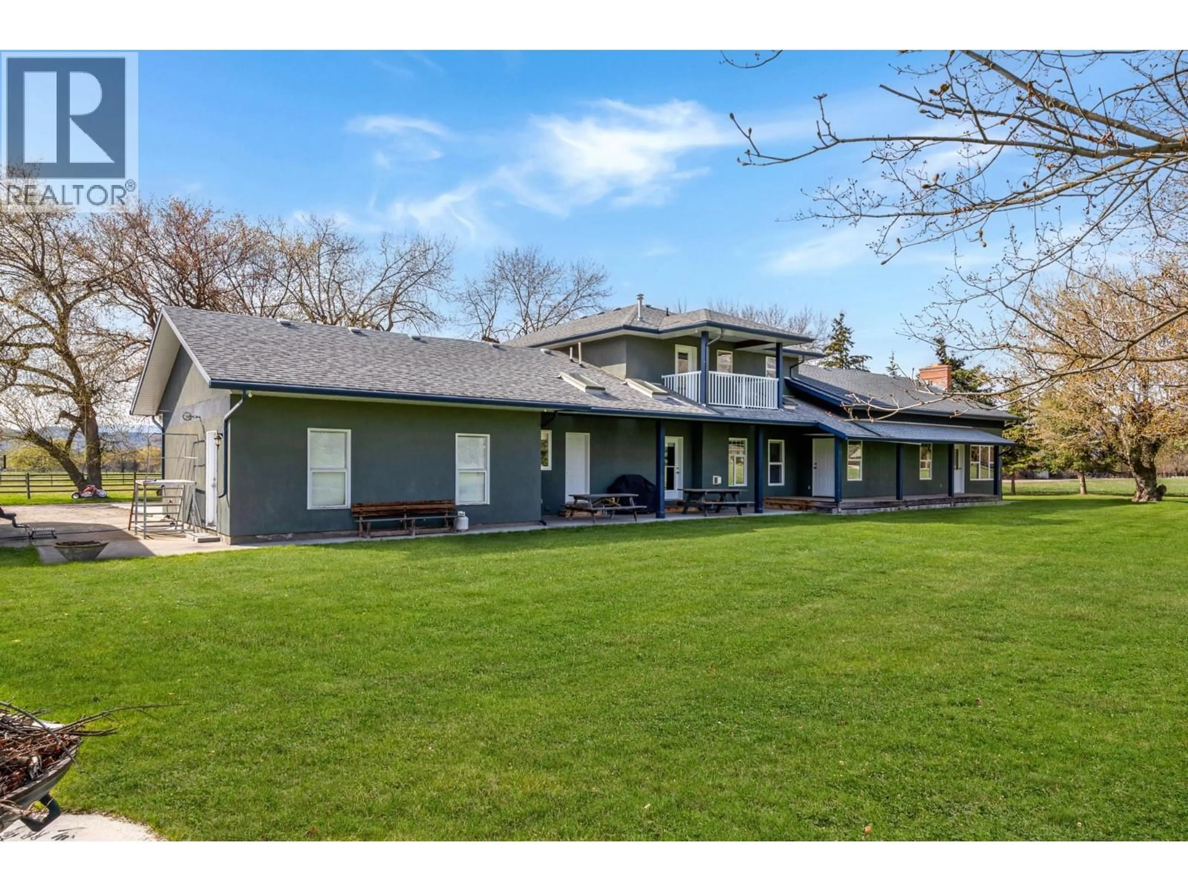 A pic from outside/outdoor area/front of a property/back of a property/a pic from drone, unknown for 9050 KALAMALKA ROAD, Coldstream British Columbia V1B3C3