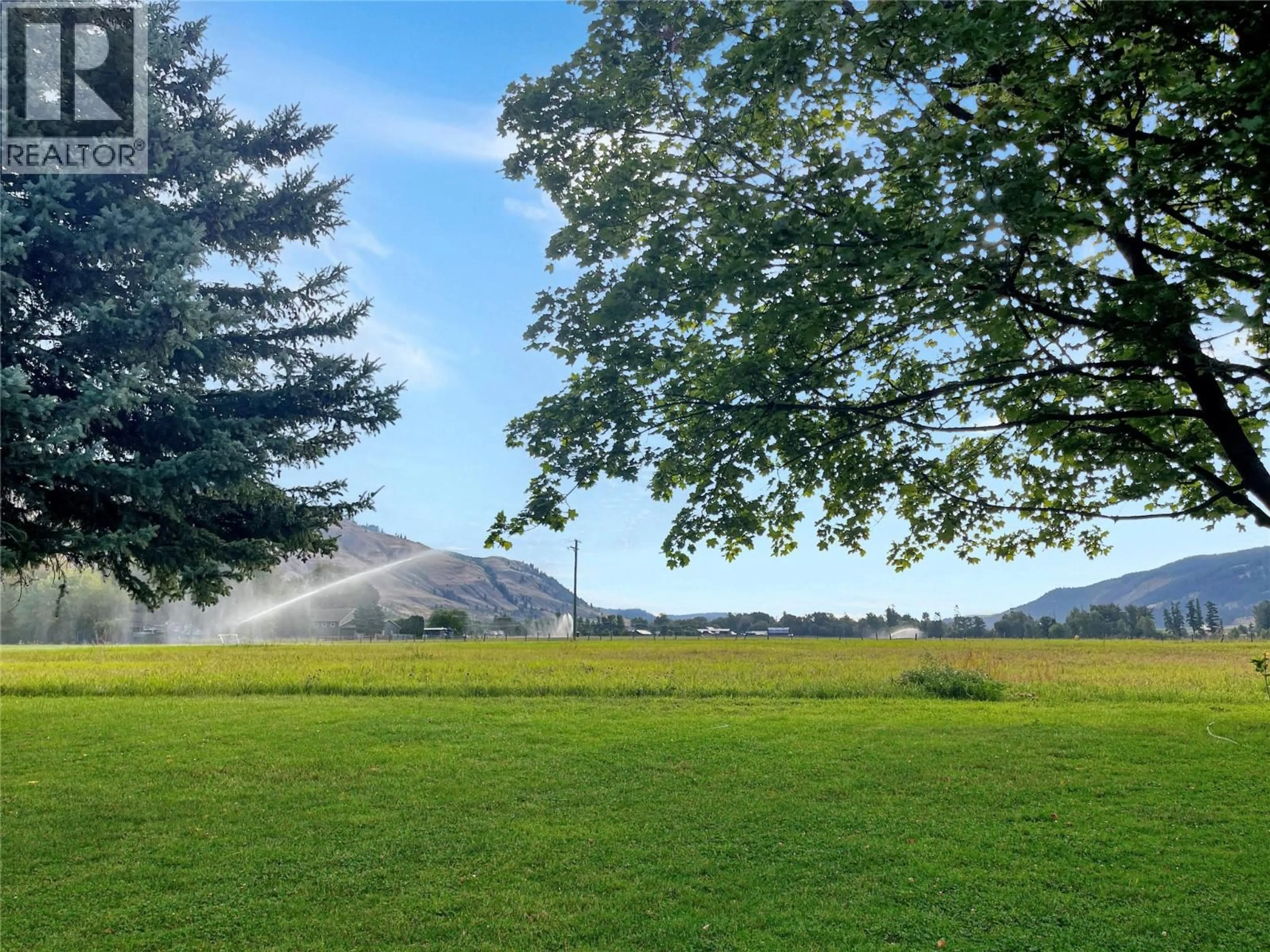 A pic from outside/outdoor area/front of a property/back of a property/a pic from drone, mountain view for 9050 KALAMALKA ROAD, Coldstream British Columbia V1B3C3