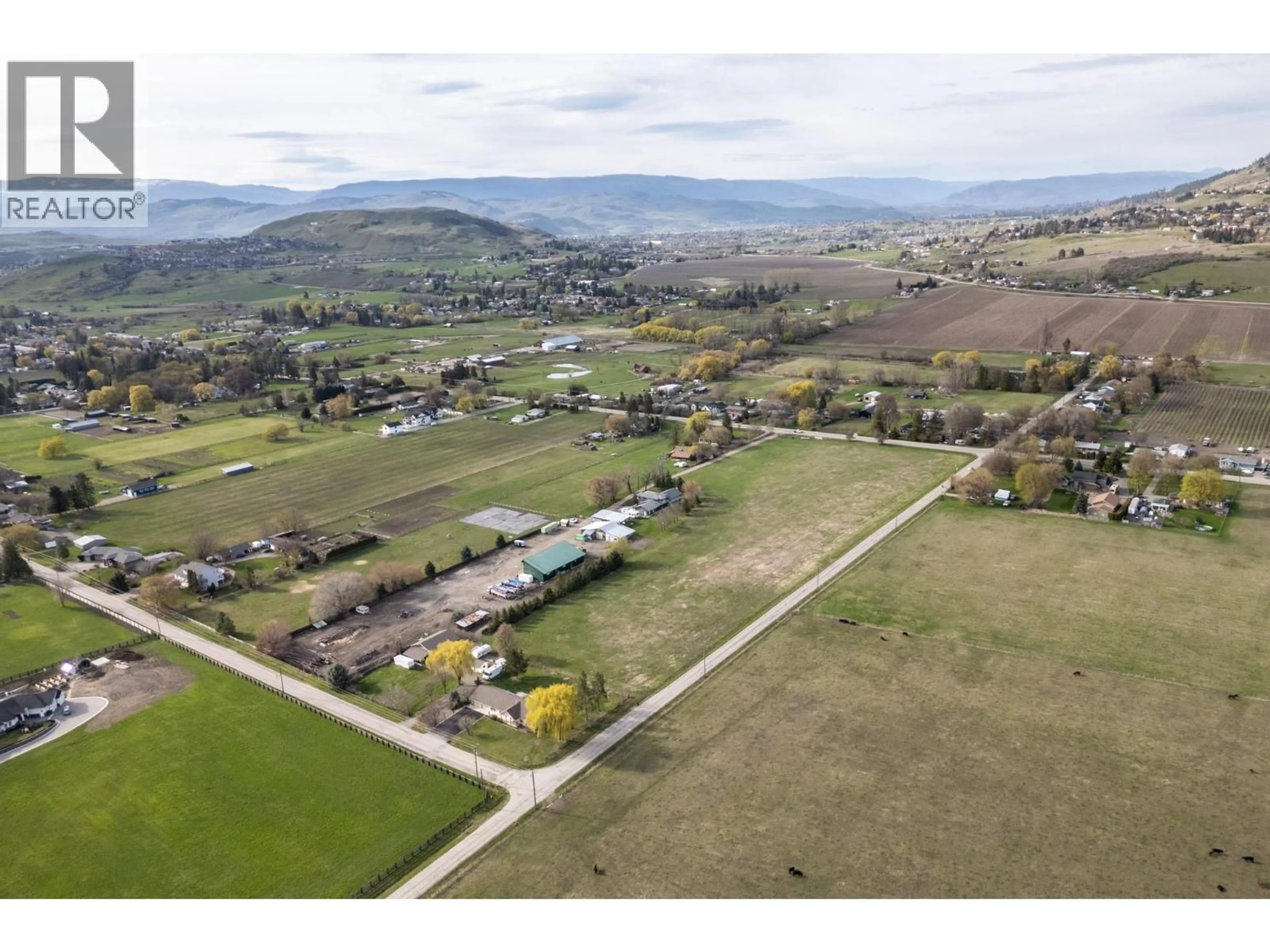 A pic from outside/outdoor area/front of a property/back of a property/a pic from drone, mountain view for 9050 KALAMALKA ROAD, Coldstream British Columbia V1B3C3