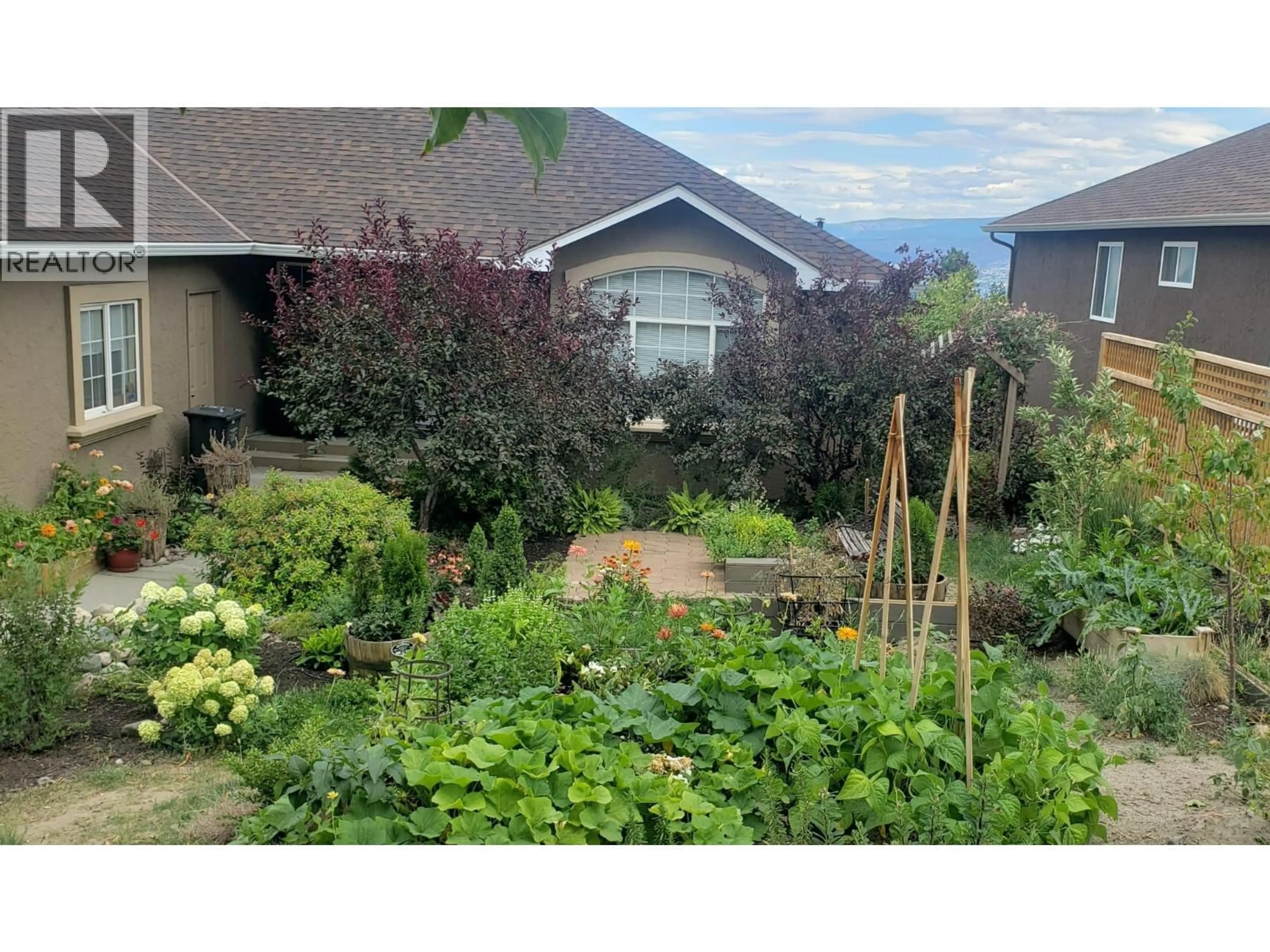 A pic from outside/outdoor area/front of a property/back of a property/a pic from drone, mountain view for 3591 GLEN EAGLES DRIVE, West Kelowna British Columbia V4T2L5