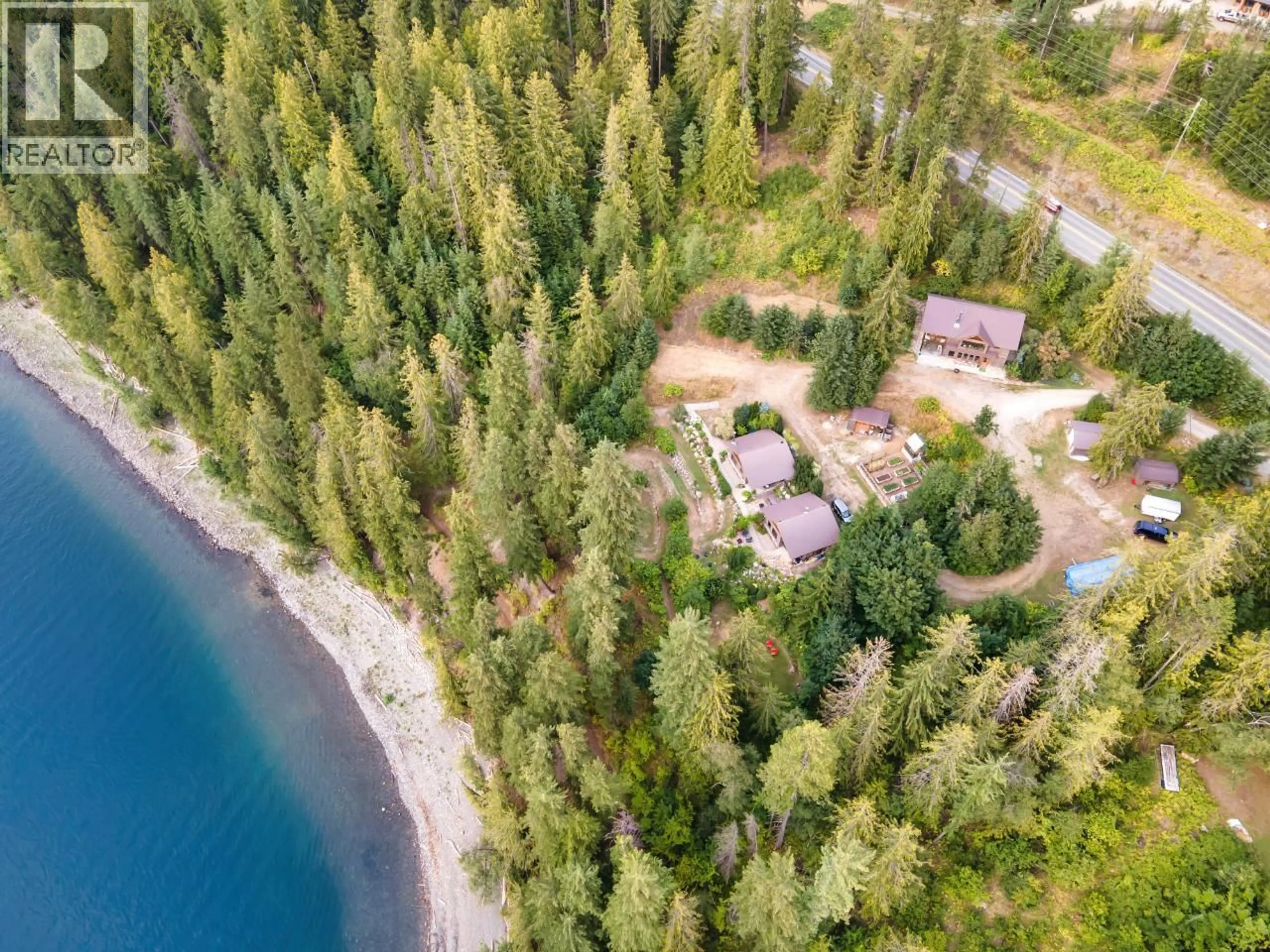 A pic from outside/outdoor area/front of a property/back of a property/a pic from drone, water/lake/river/ocean view for 6575 6 HIGHWAY, New Denver British Columbia V0G1S0