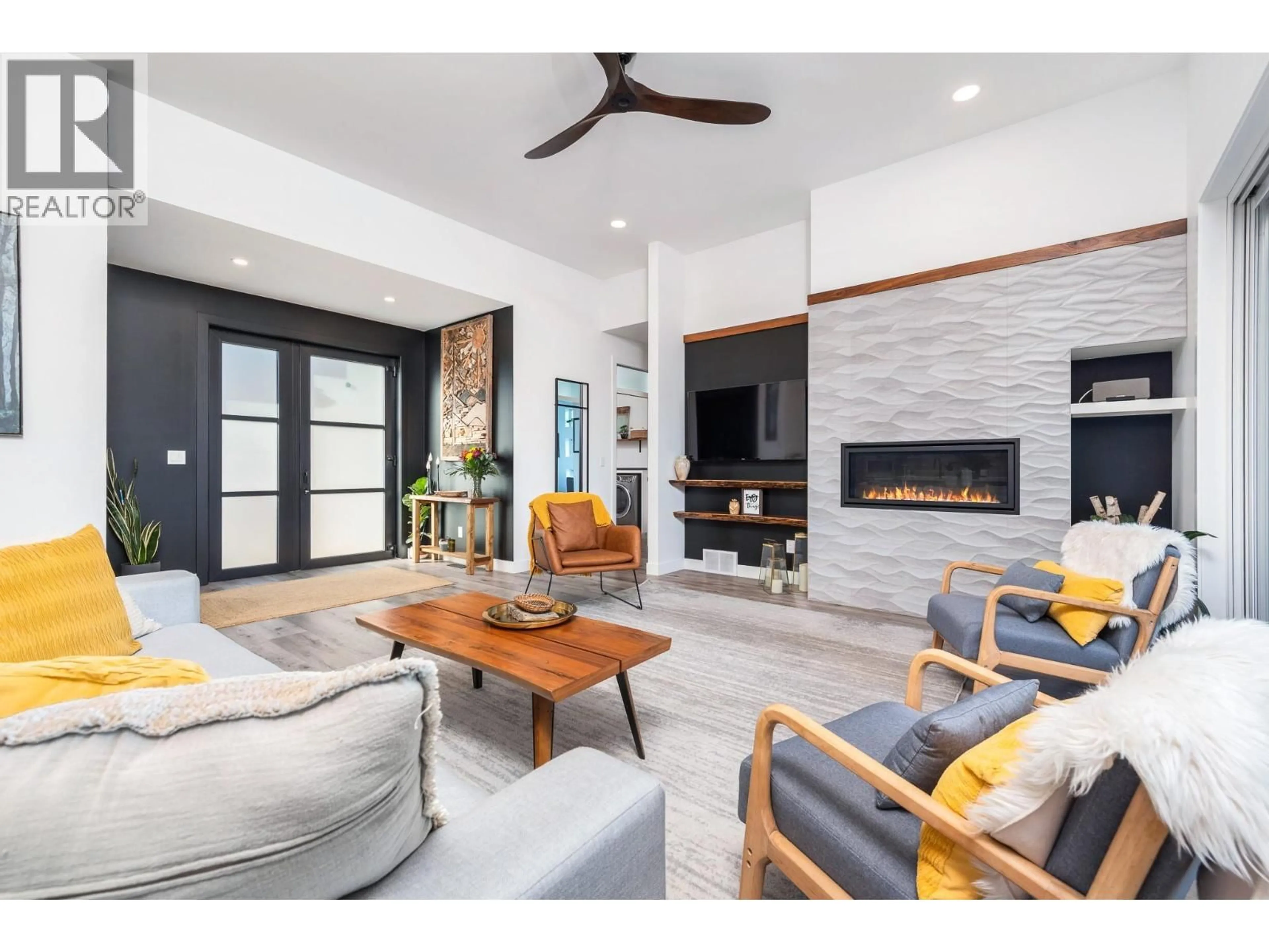 Living room with furniture, ceramic/tile floor for 29 - 9196 TRONSON ROAD, Vernon British Columbia V1H1E8