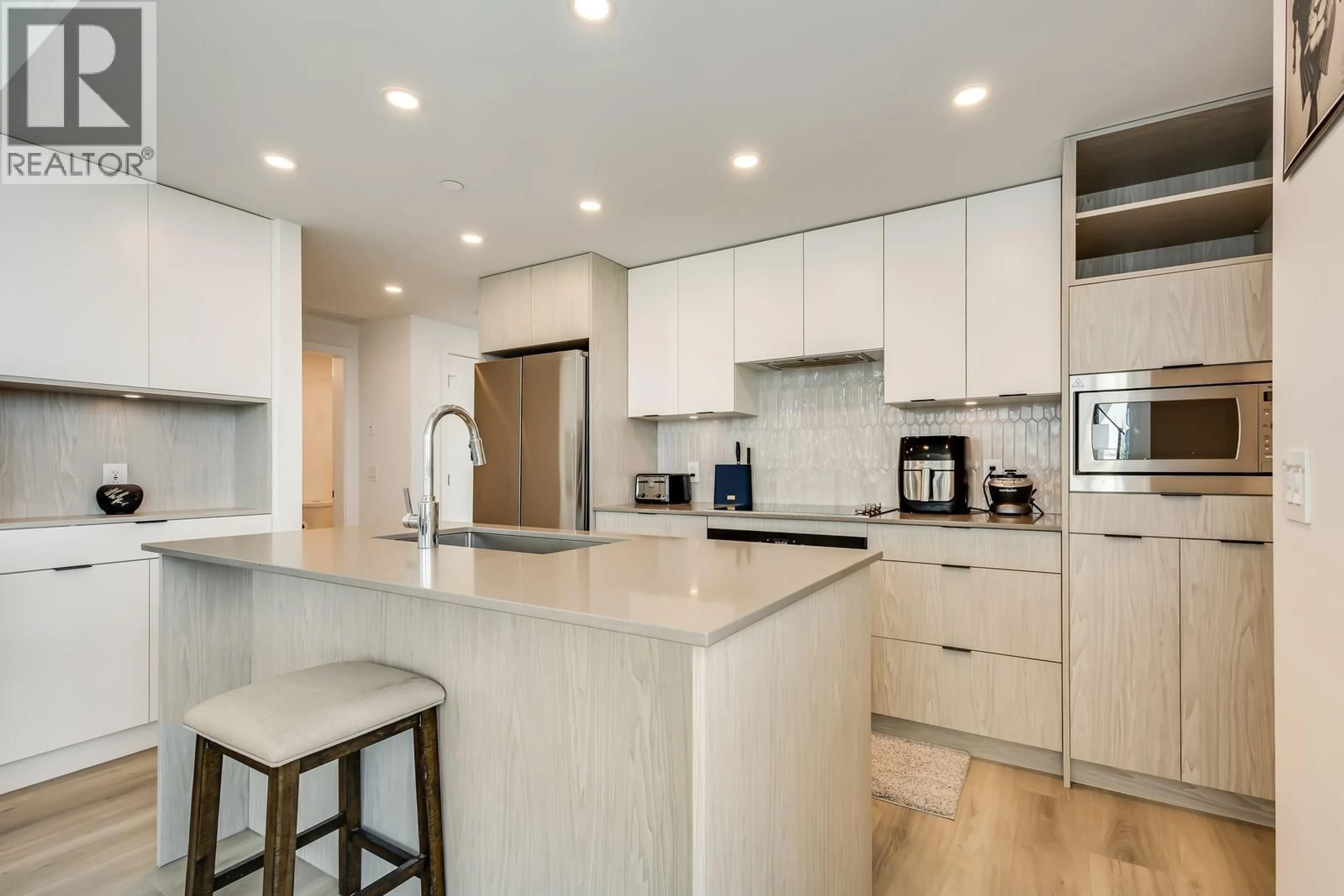Contemporary kitchen, ceramic/tile floor for 2502 - 1488 BERTRAM STREET, Kelowna British Columbia V1Y0M6