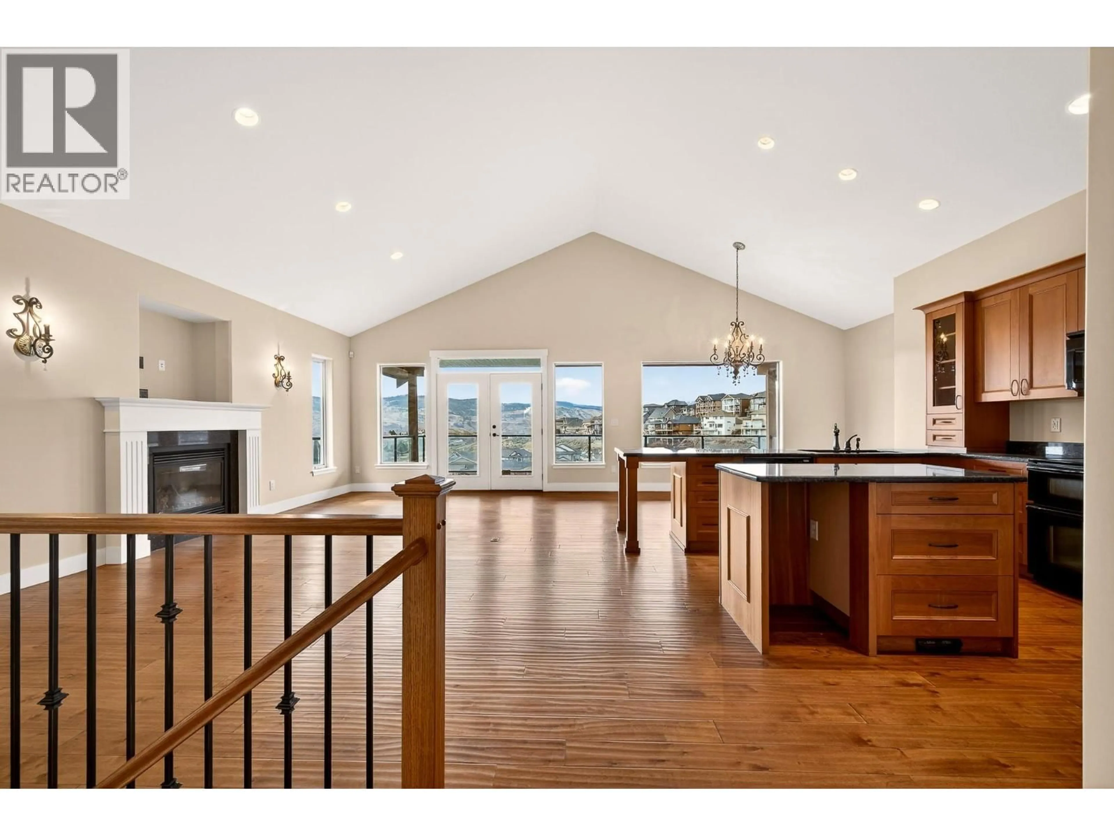 Open concept kitchen, wood/laminate floor for 1067 QUAIL DRIVE, Kamloops British Columbia V2B8N9