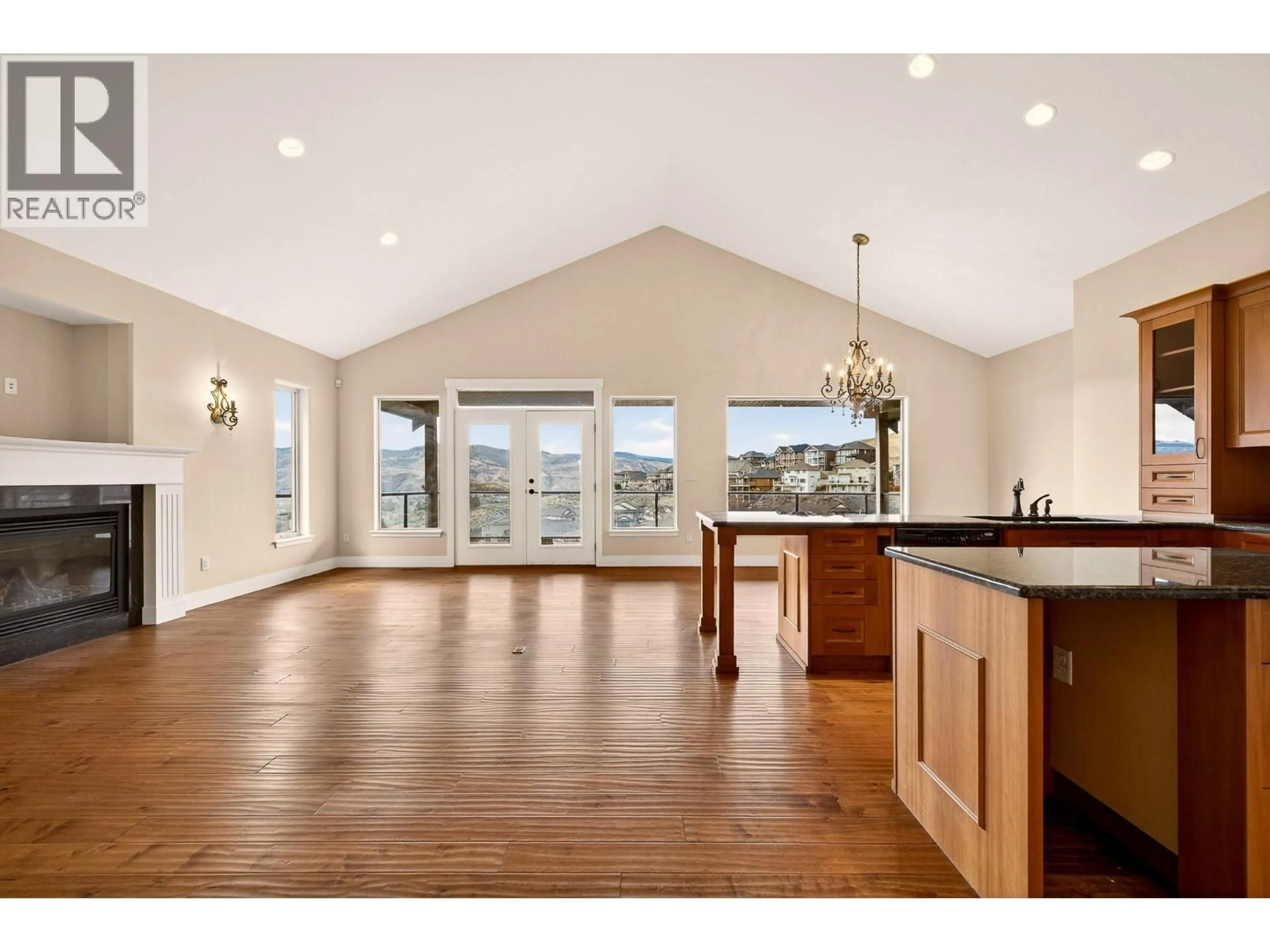 Open concept kitchen, wood/laminate floor for 1067 QUAIL DRIVE, Kamloops British Columbia V2B8N9