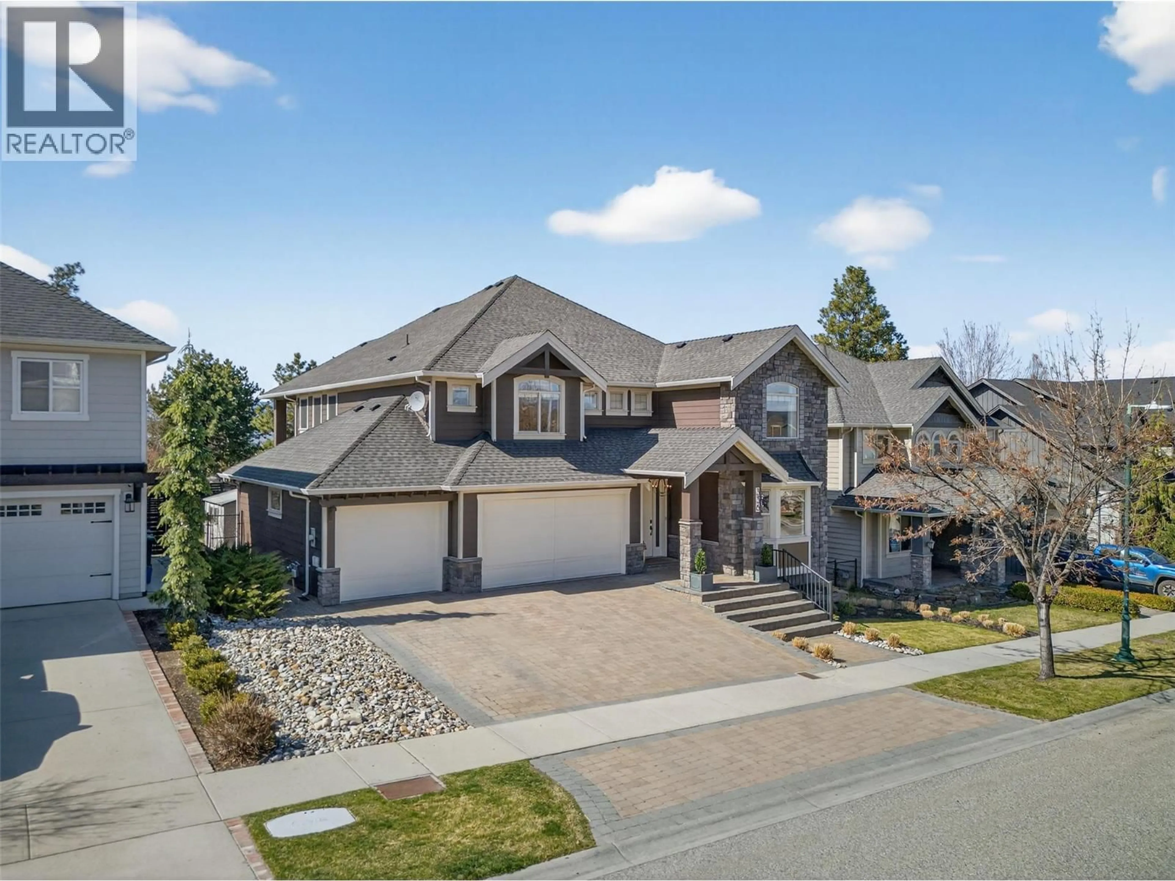A pic from outside/outdoor area/front of a property/back of a property/a pic from drone, street for 336 QUILCHENA DRIVE, Kelowna British Columbia V1W4Y9