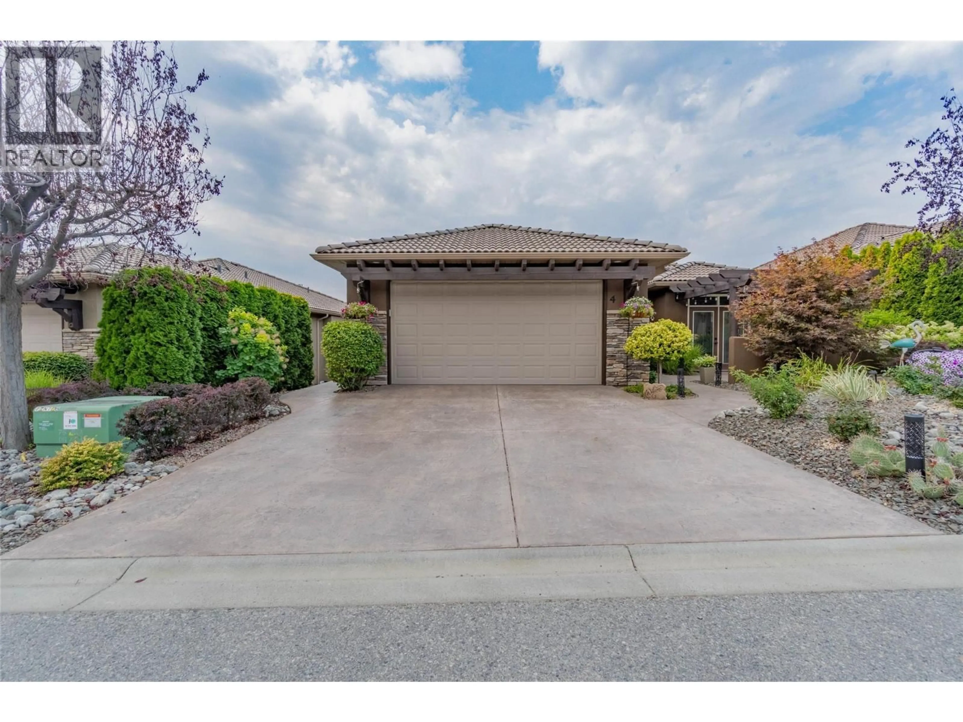 A pic from outside/outdoor area/front of a property/back of a property/a pic from drone, street for 4 - 4110 36TH AVENUE, Osoyoos British Columbia V0H1V6