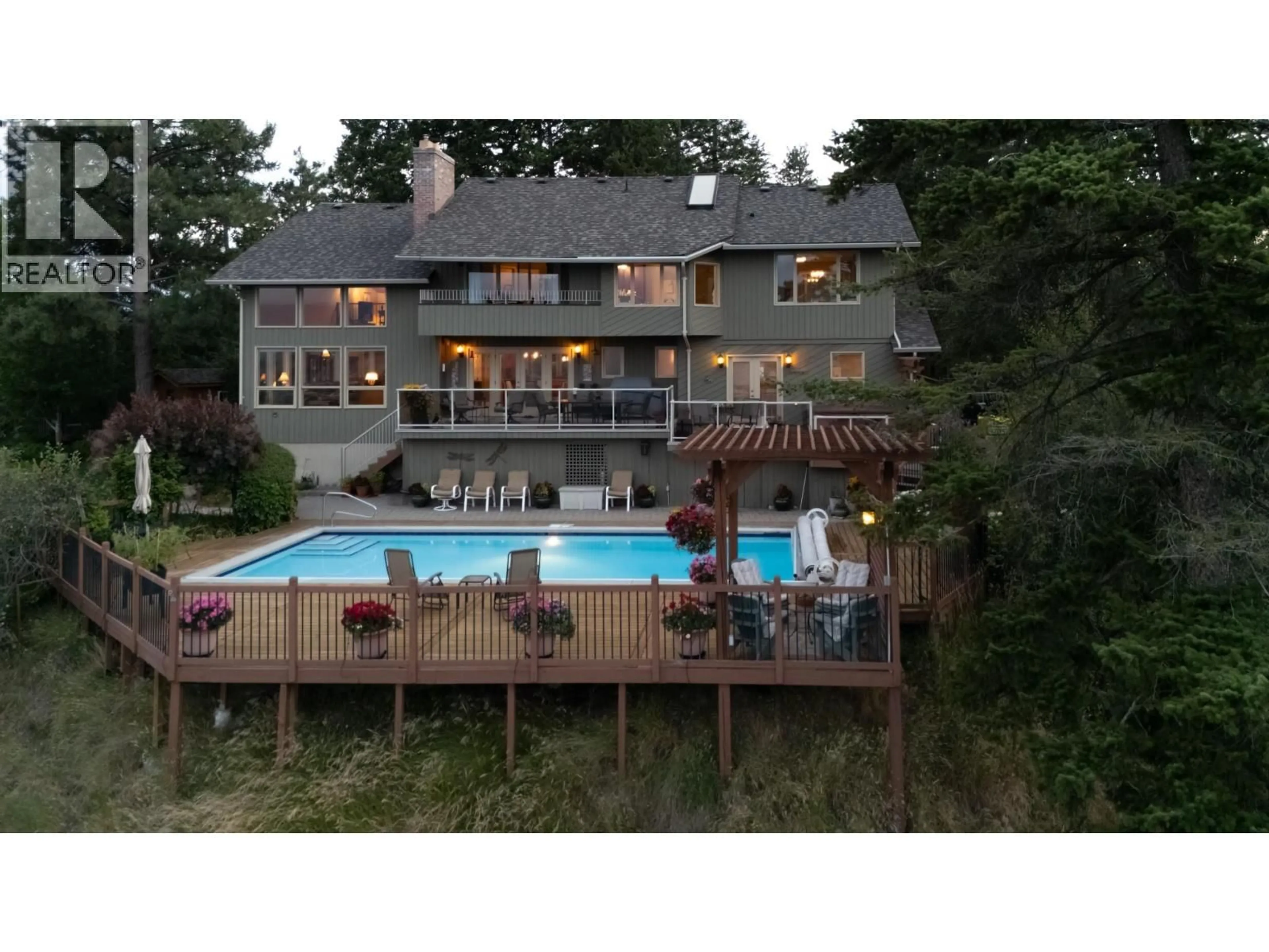 A pic from outside/outdoor area/front of a property/back of a property/a pic from drone, water/lake/river/ocean view for 1776 KELOKA DRIVE, West Kelowna British Columbia V1Z2X1