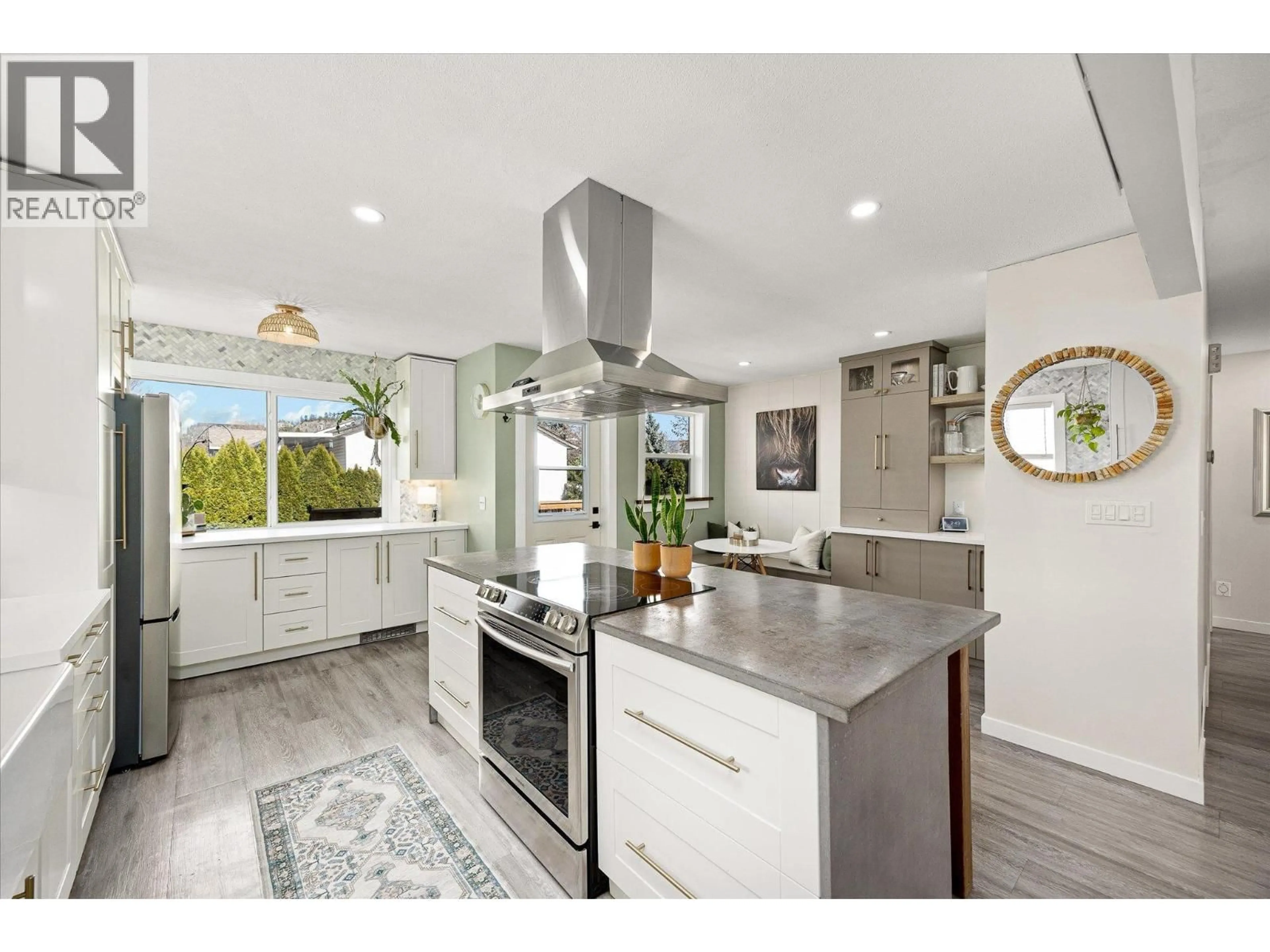 Open concept kitchen, ceramic/tile floor for 1872 MILLARD COURT, Kelowna British Columbia V1V1R2