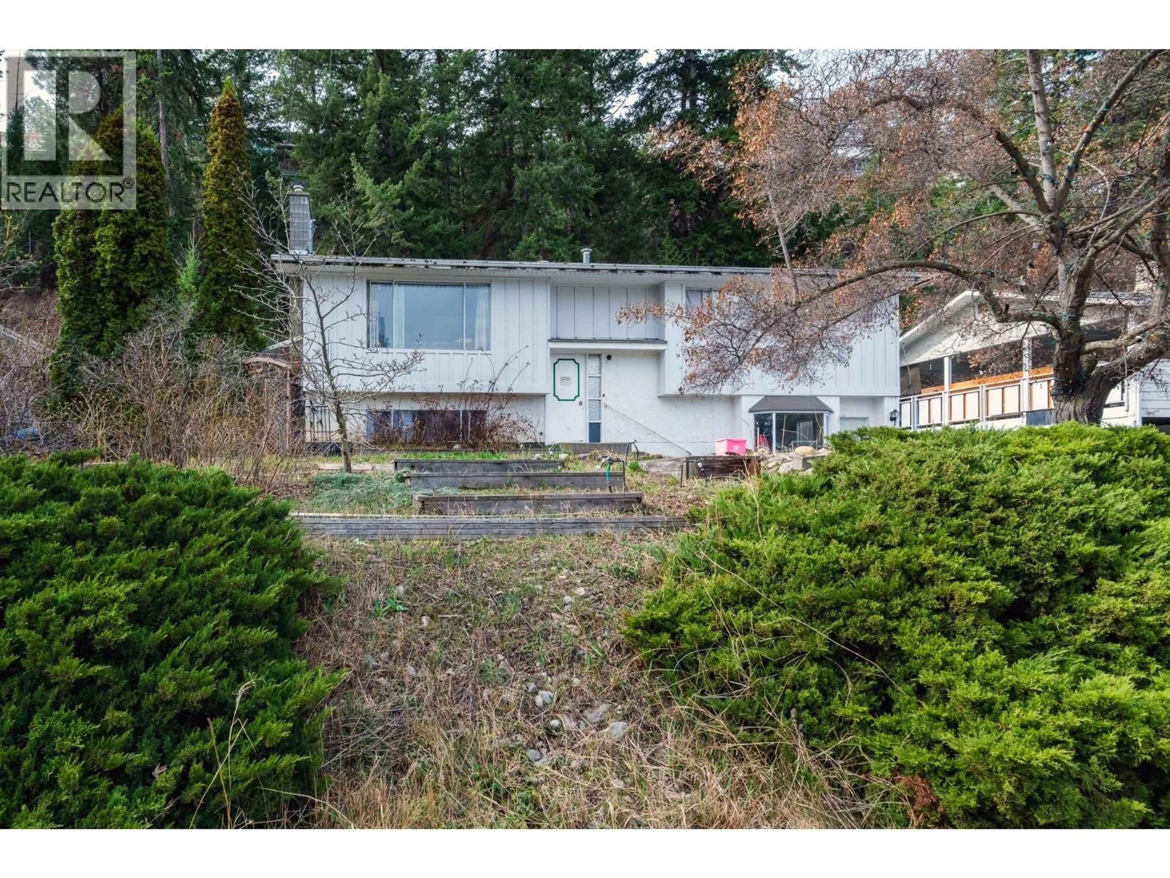 A pic from outside/outdoor area/front of a property/back of a property/a pic from drone, unknown for 3256 MCIVER ROAD, West Kelowna British Columbia V4T1G2