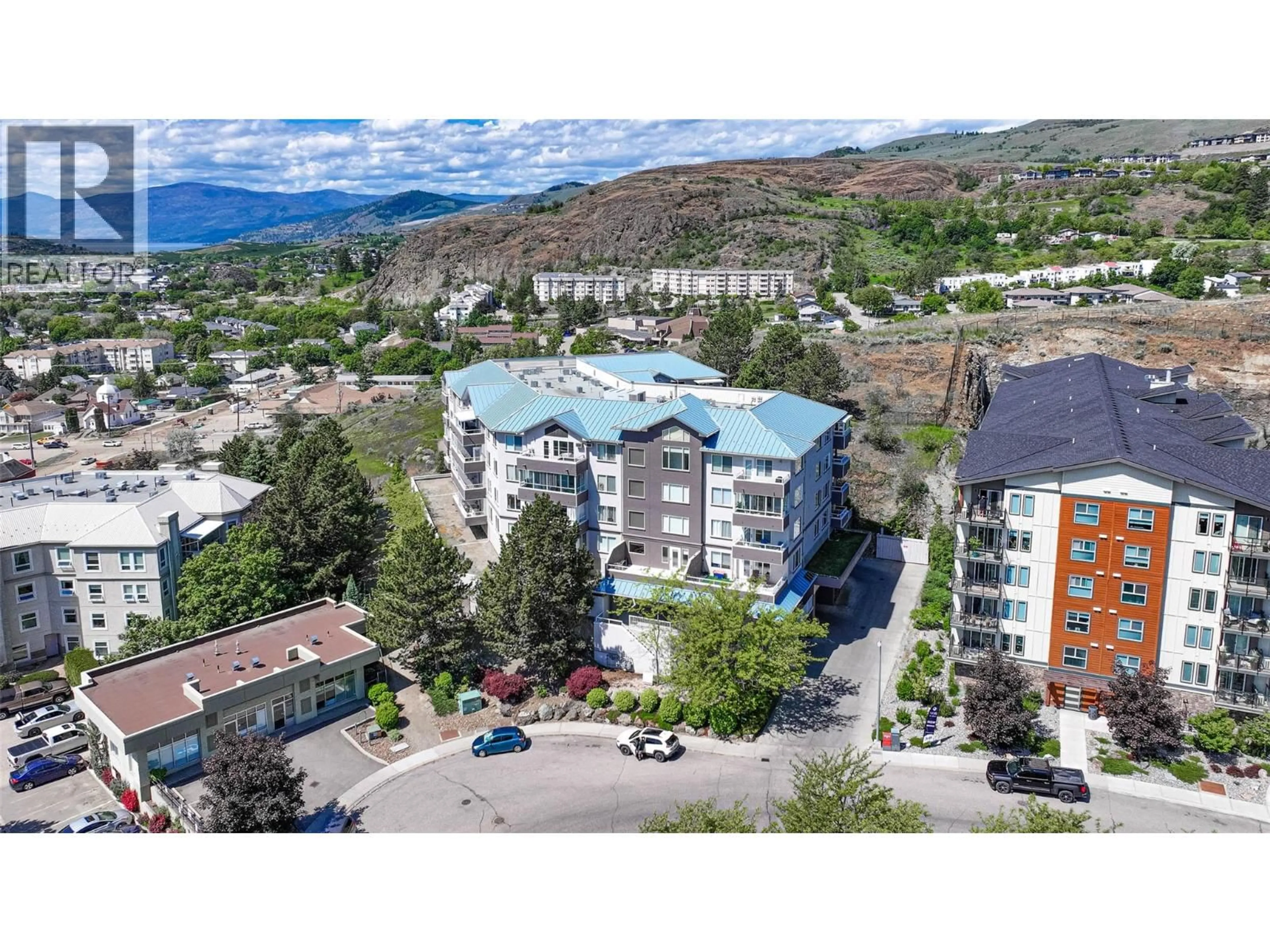 A pic from outside/outdoor area/front of a property/back of a property/a pic from drone, mountain view for 403 - 3320 CENTENNIAL DRIVE, Vernon British Columbia V1T9M4