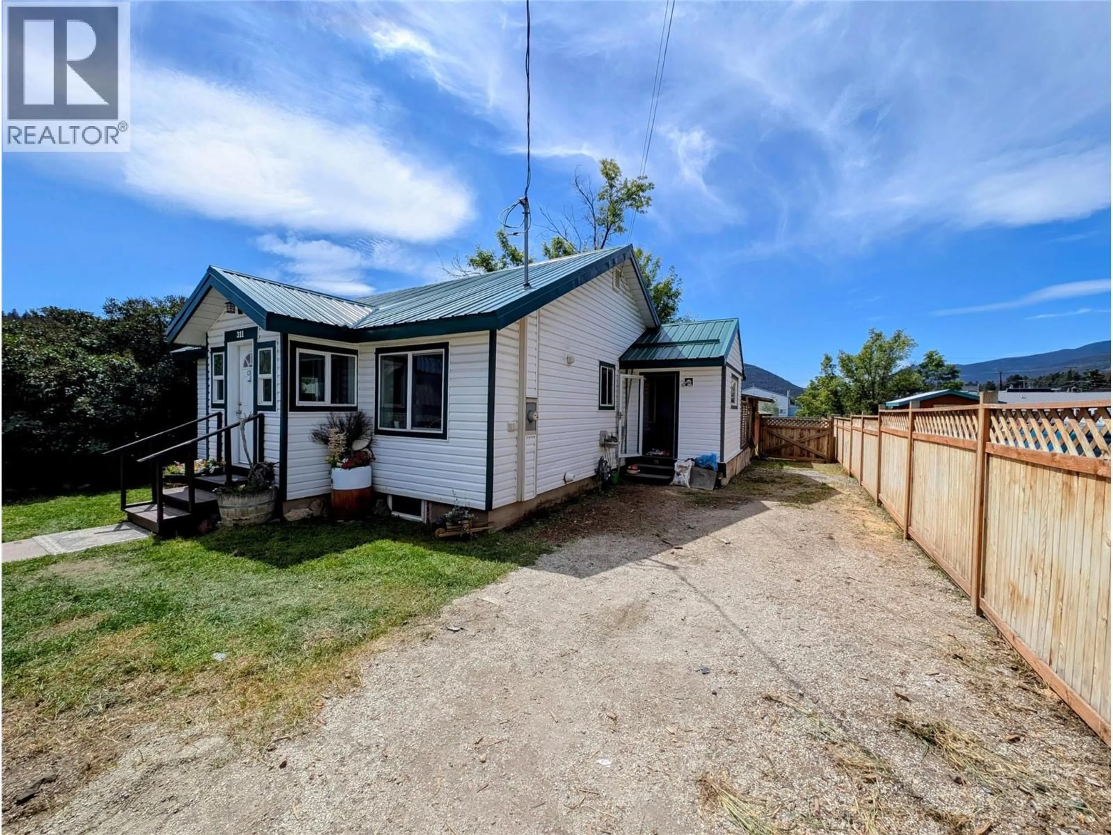 A pic from outside/outdoor area/front of a property/back of a property/a pic from drone, street for 311 DEWDNEY AVENUE, Clinton British Columbia V0K1K0