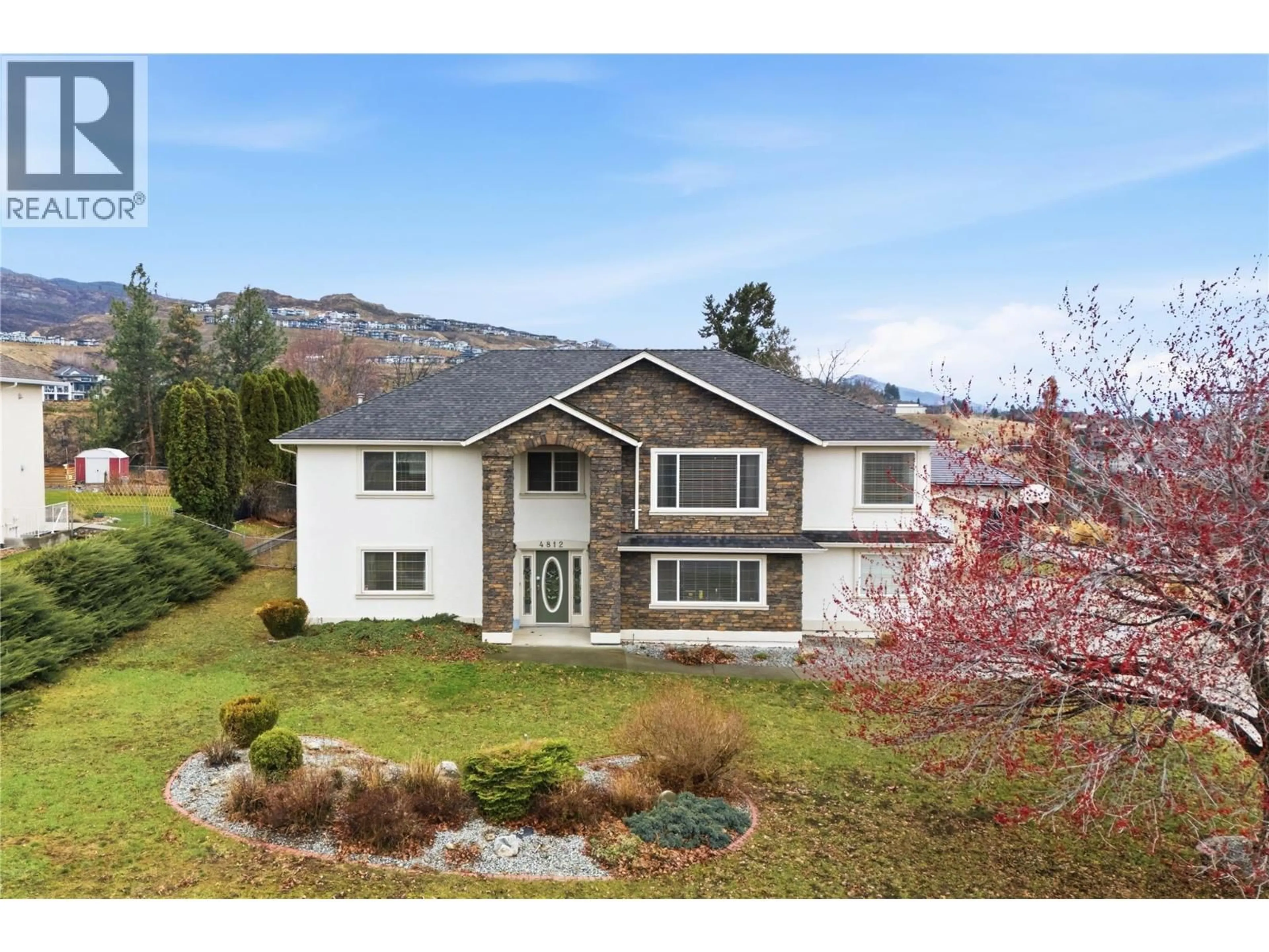 Home with vinyl exterior material, mountain view for 4812 WESTRIDGE DRIVE, Kelowna British Columbia V1W3B5