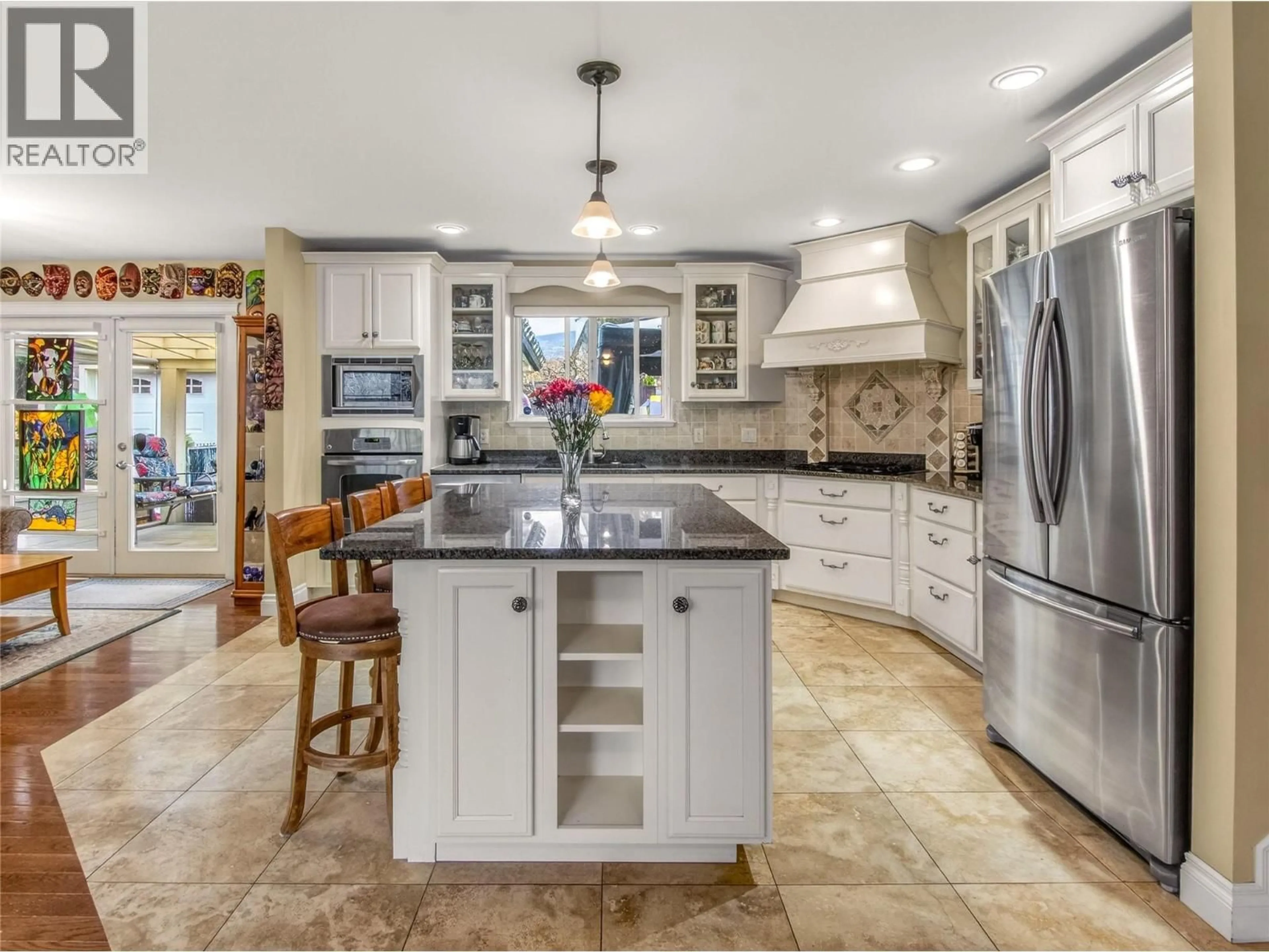 Open concept kitchen, ceramic/tile floor for 2636 CORNWALL DRIVE, Penticton British Columbia V2A6X3