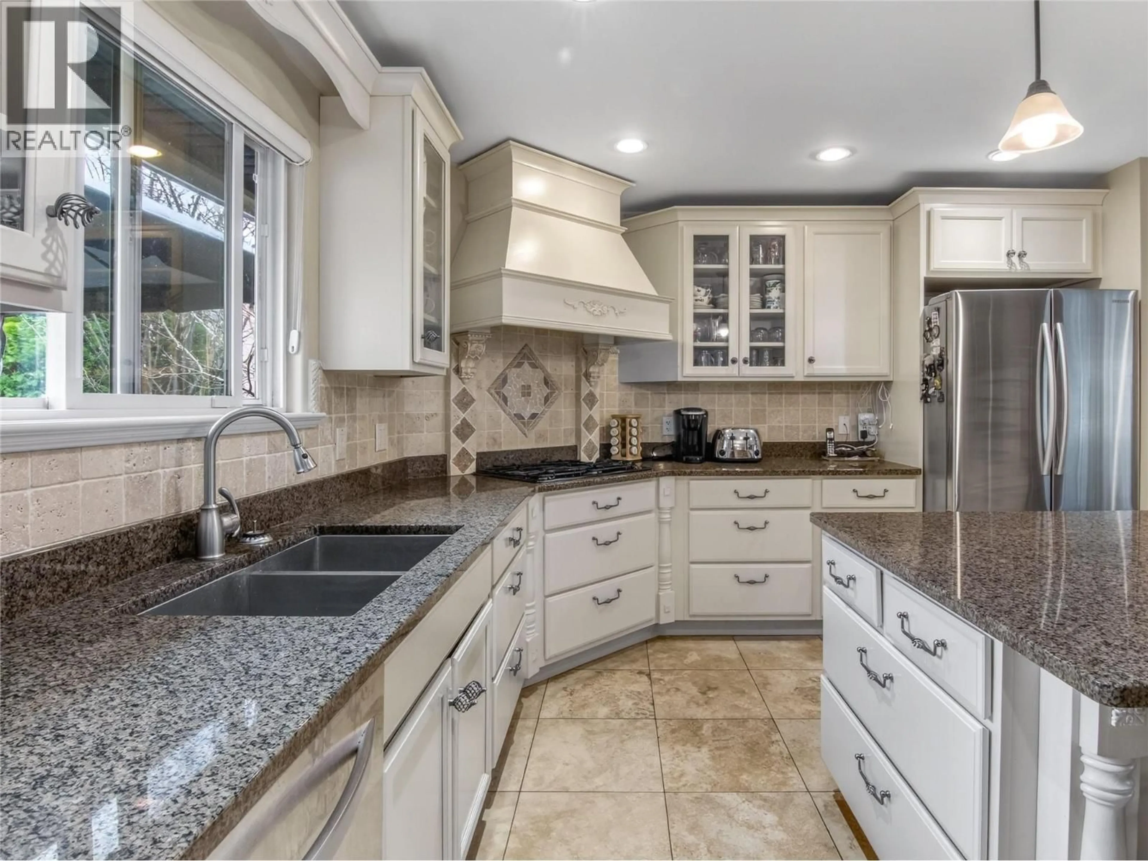 Open concept kitchen, ceramic/tile floor for 2636 CORNWALL DRIVE, Penticton British Columbia V2A6X3