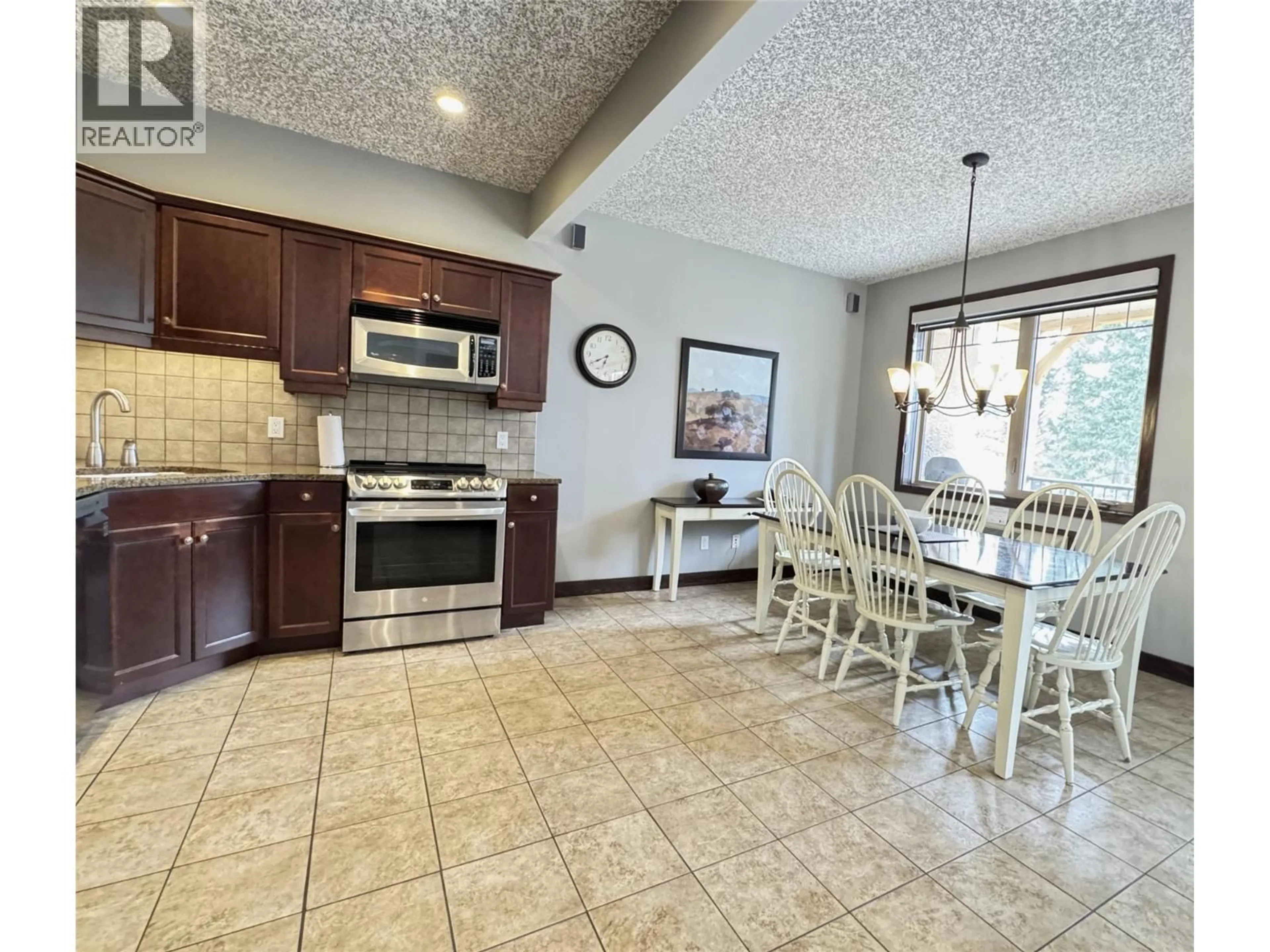 Open concept kitchen, ceramic/tile floor for 322D - 300 BIGHORN BOULEVARD, Radium Hot Springs British Columbia V0A1M0