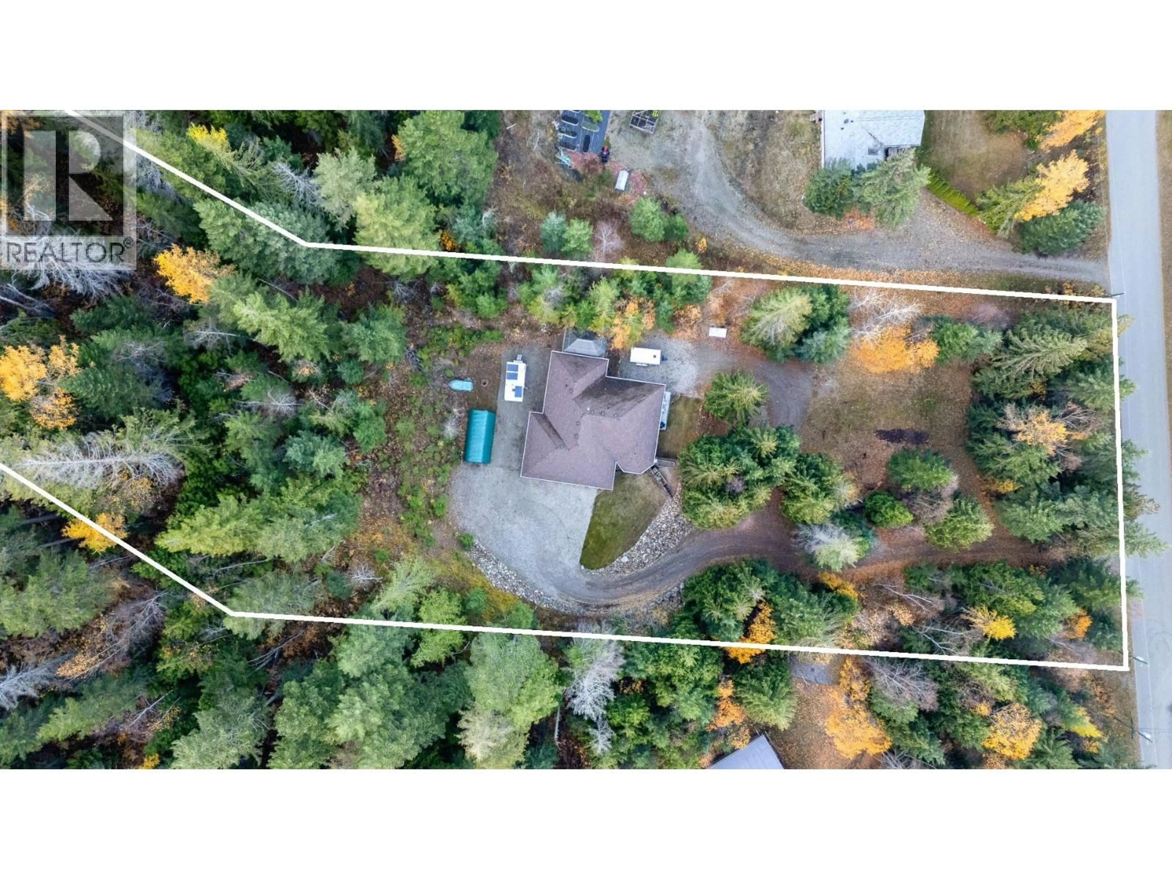 A pic from outside/outdoor area/front of a property/back of a property/a pic from drone, forest/trees view for 307 PARTRIDGE ROAD, Tappen British Columbia V1E3A4