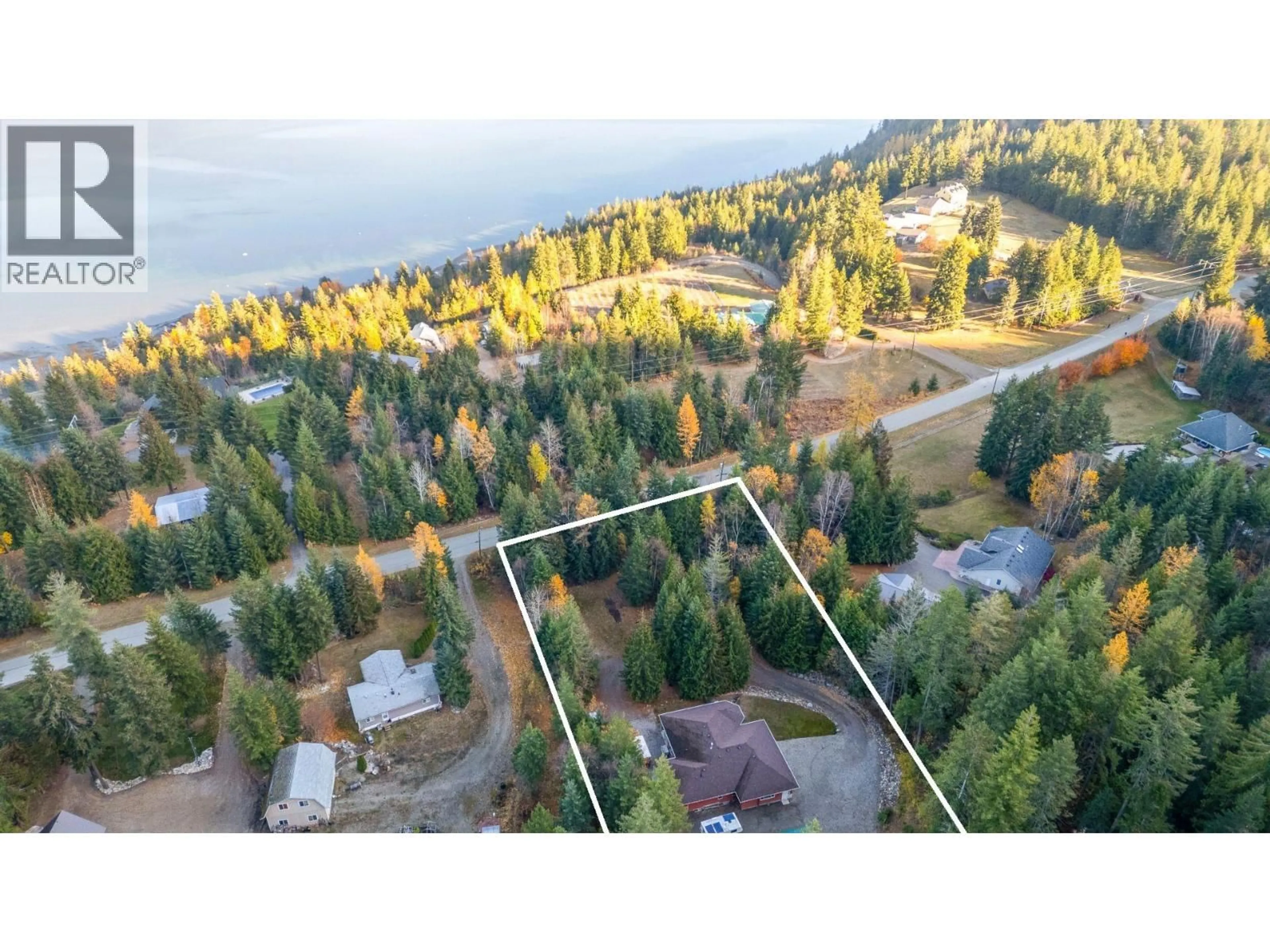 A pic from outside/outdoor area/front of a property/back of a property/a pic from drone, water/lake/river/ocean view for 307 PARTRIDGE ROAD, Tappen British Columbia V1E3A4
