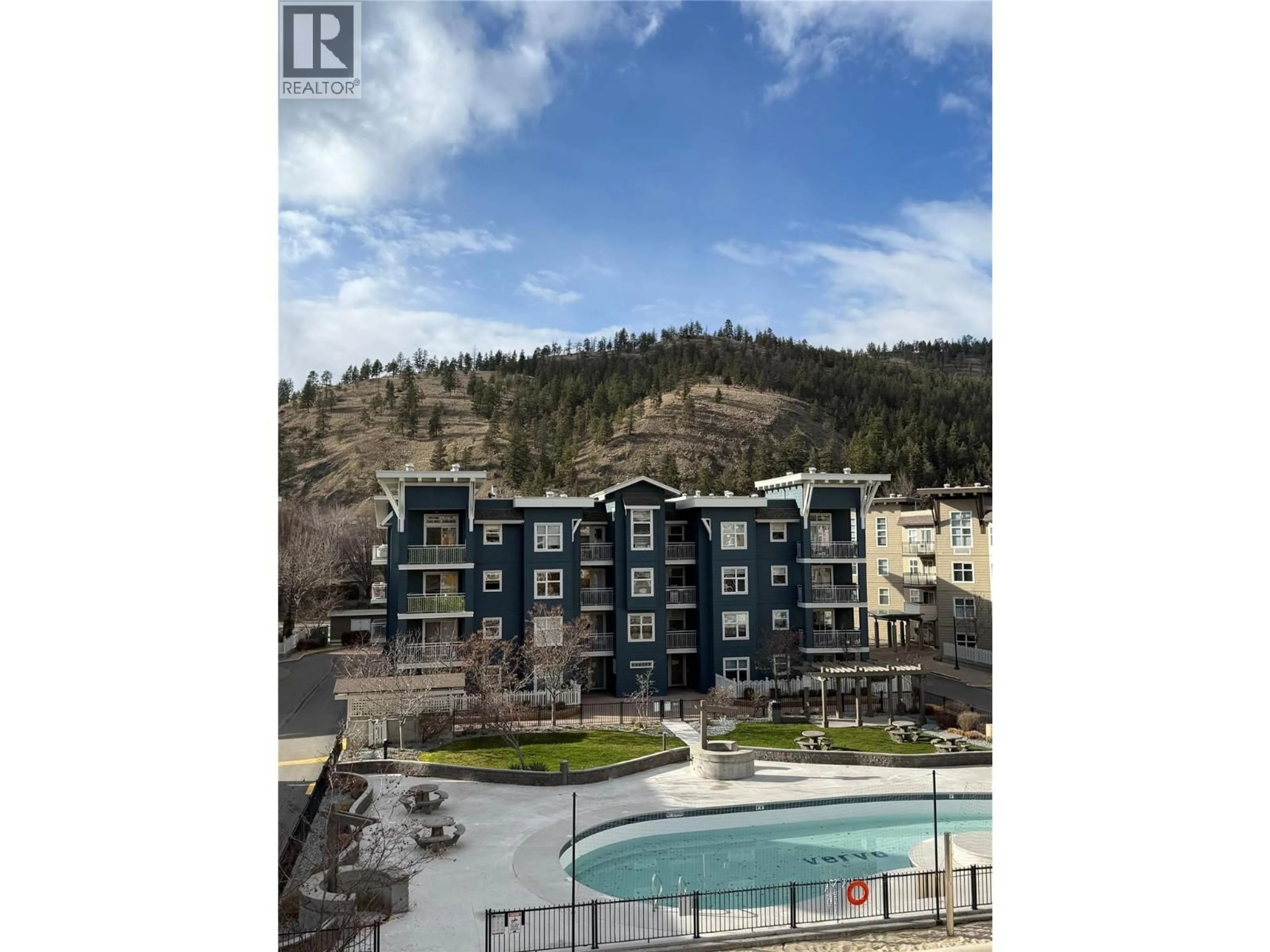 A pic from outside/outdoor area/front of a property/back of a property/a pic from drone, water/lake/river/ocean view for 403 - 571 YATES ROAD, Kelowna British Columbia V1V2V5