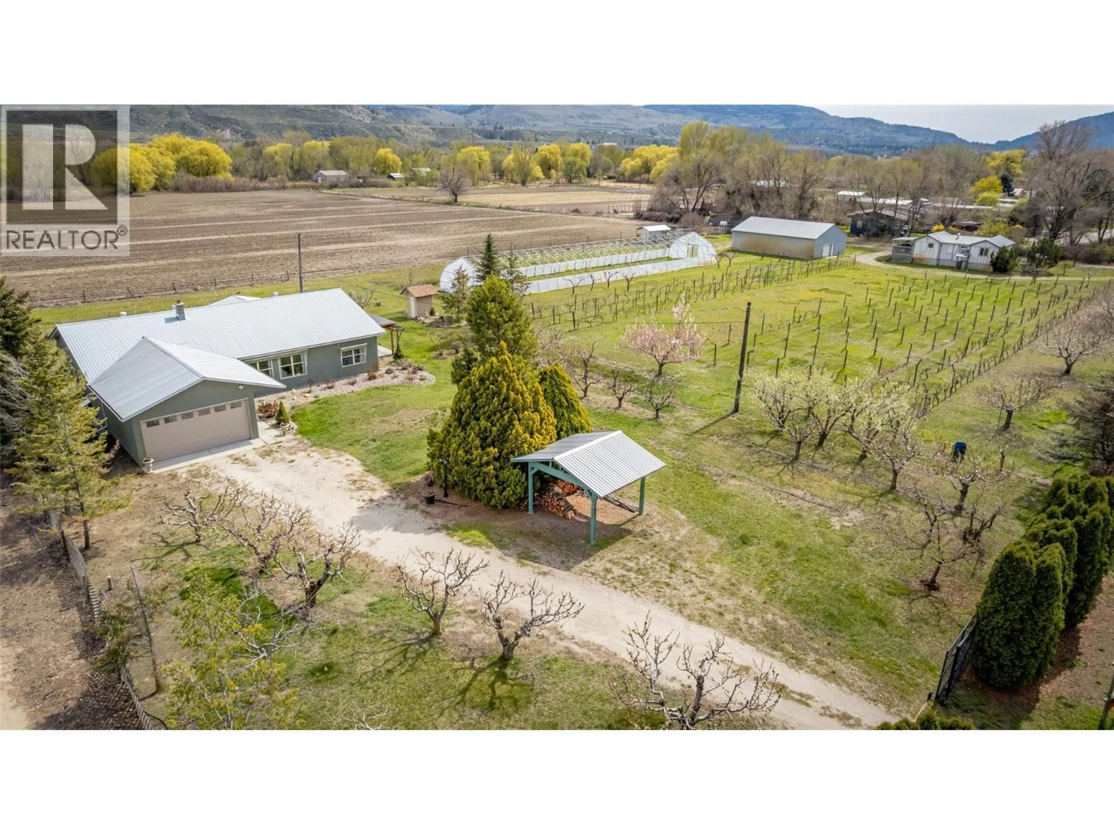 A pic from outside/outdoor area/front of a property/back of a property/a pic from drone, mountain view for 7231 ISLAND ROAD, Oliver British Columbia V0H1T7