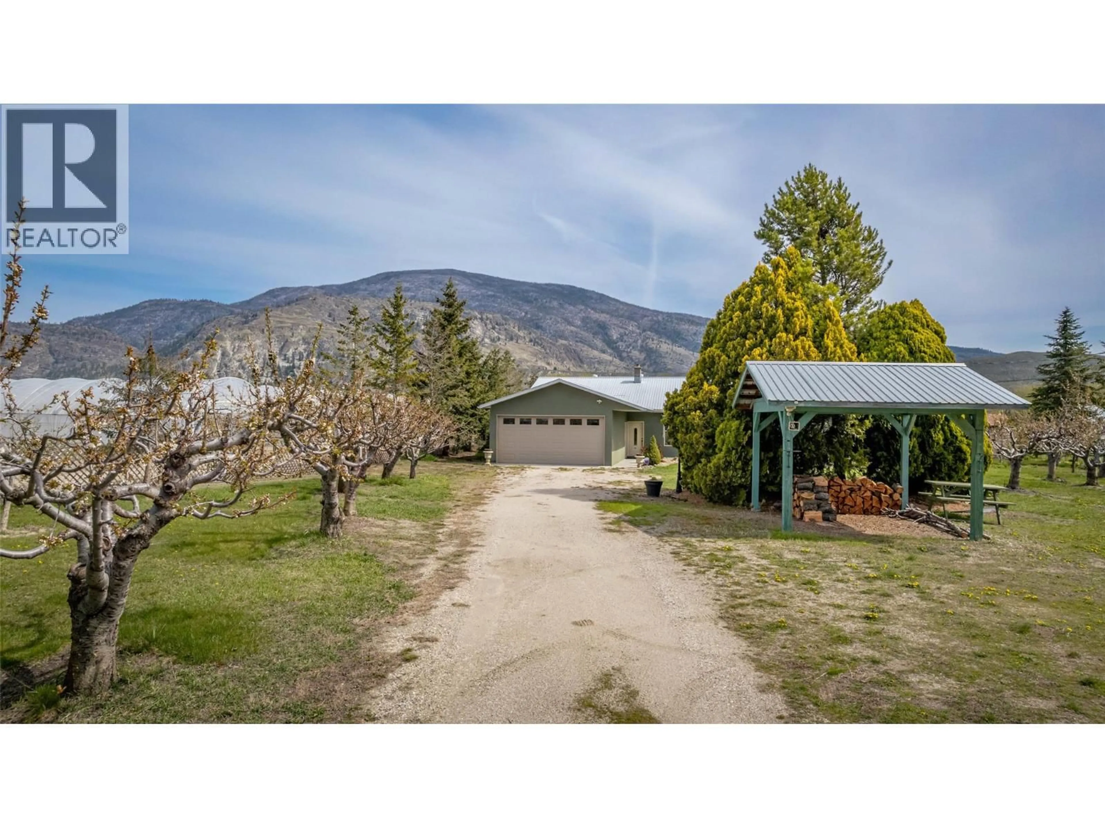 A pic from outside/outdoor area/front of a property/back of a property/a pic from drone, mountain view for 7231 ISLAND ROAD, Oliver British Columbia V0H1T7