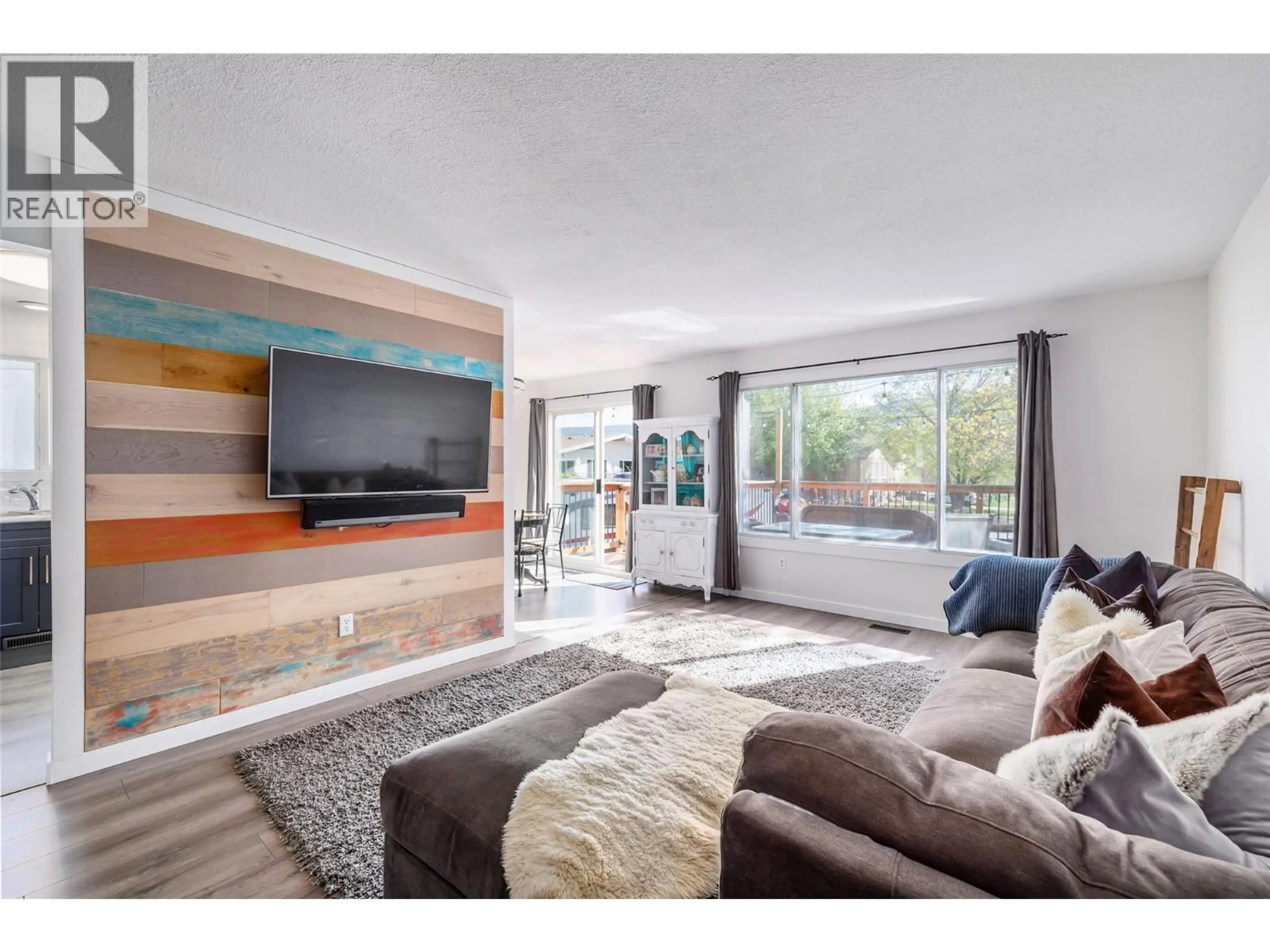 Living room with furniture, unknown for 610 CHEPESUIK COURT, Kelowna British Columbia V1X5S5