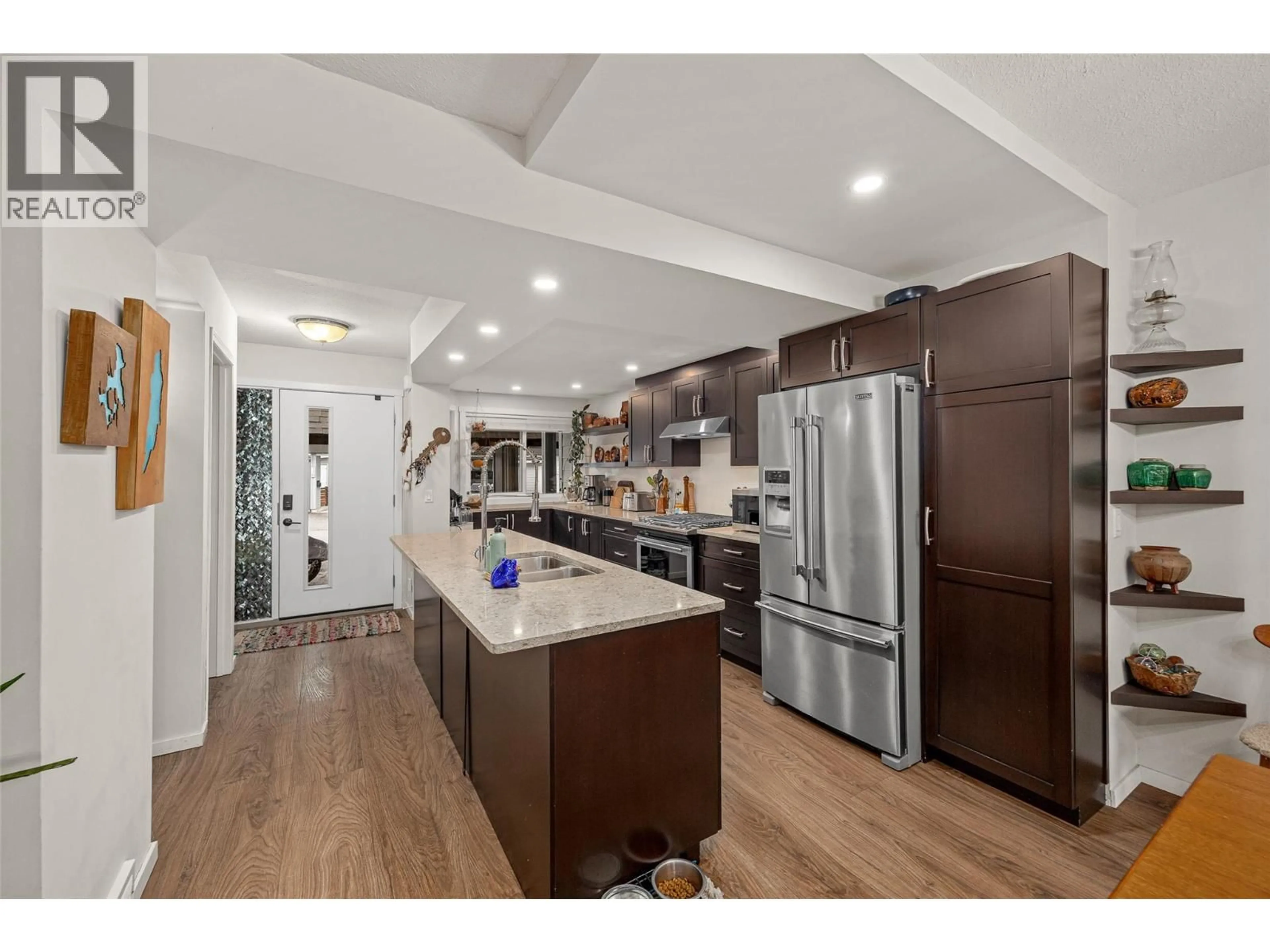 Open concept kitchen, unknown for 210 - 2125 BURTCH ROAD, Kelowna British Columbia V1Y8N1