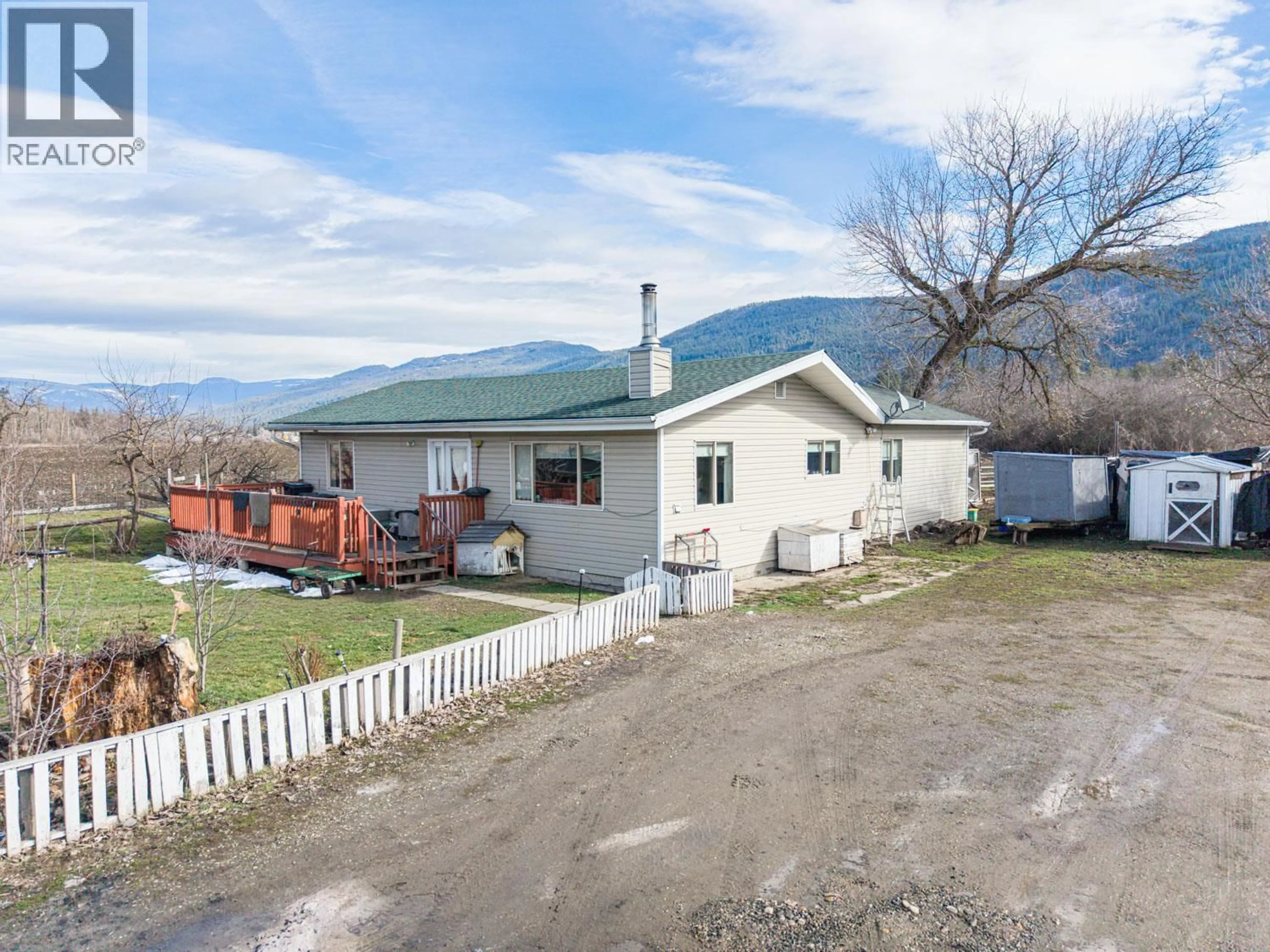 A pic from outside/outdoor area/front of a property/back of a property/a pic from drone, mountain view for 4536 97A HIGHWAY, Spallumcheen British Columbia V4Y0S1