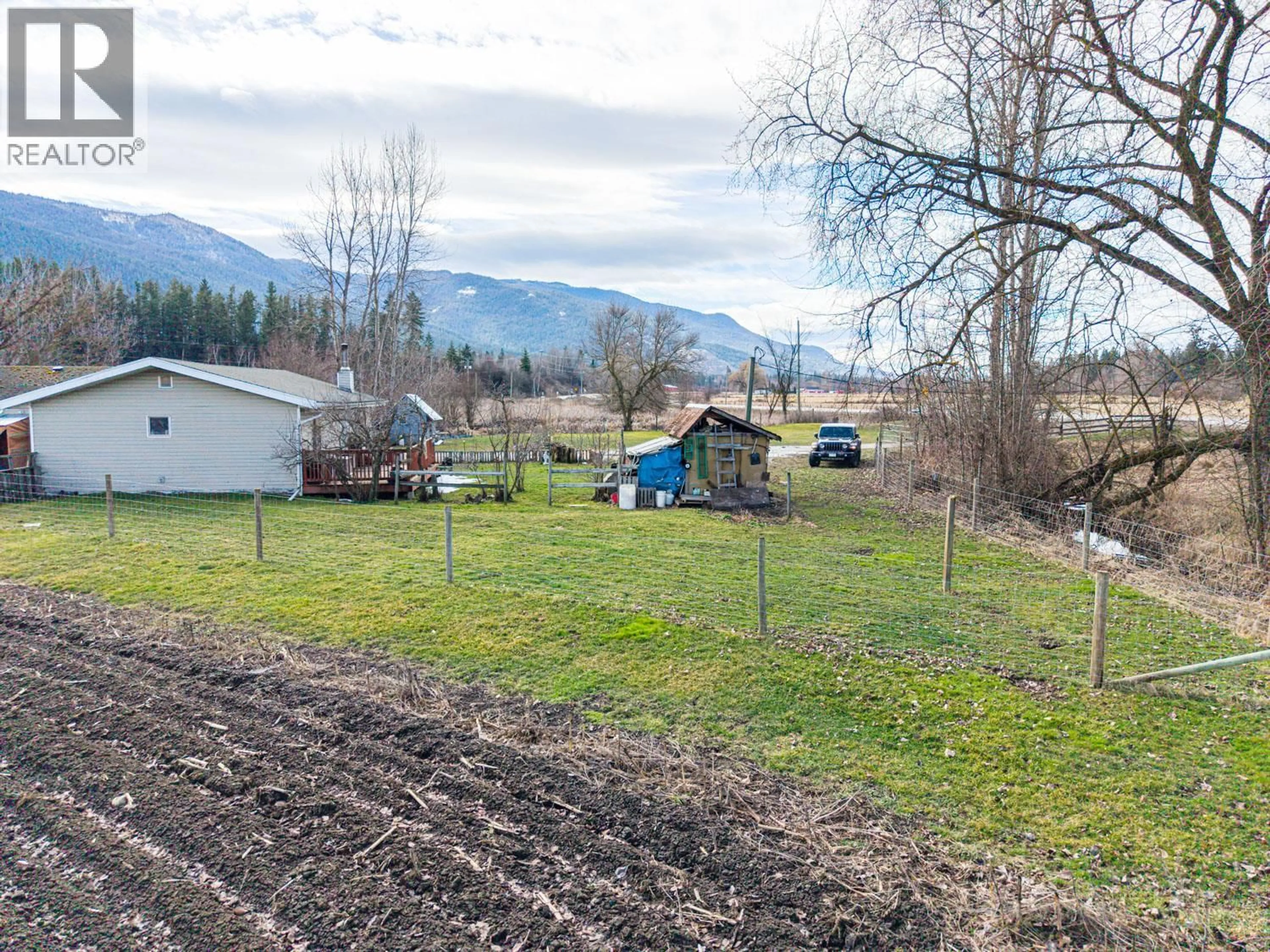 A pic from outside/outdoor area/front of a property/back of a property/a pic from drone, mountain view for 4536 97A HIGHWAY, Spallumcheen British Columbia V4Y0S1