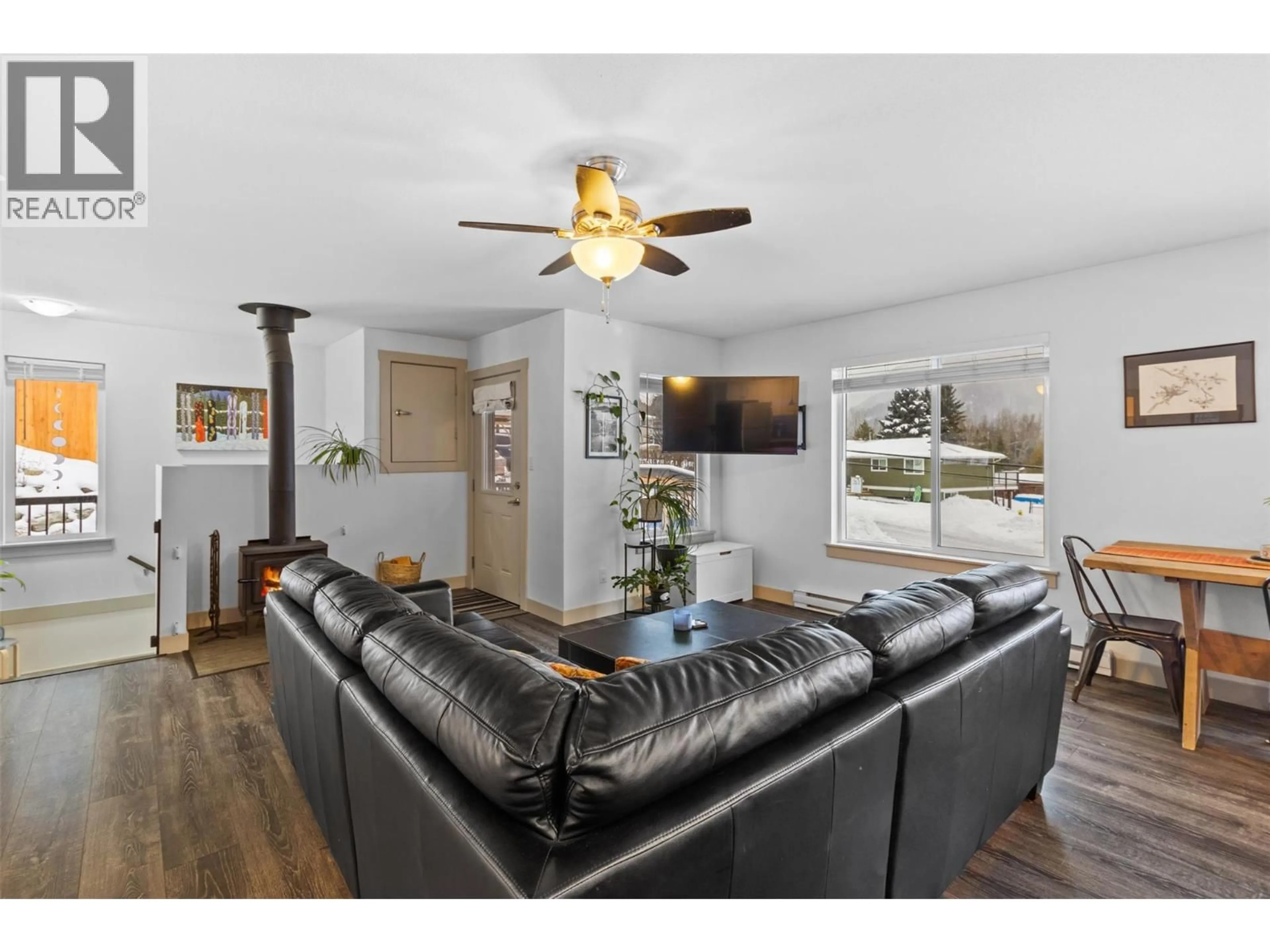 Living room with furniture, wood/laminate floor for 7370 CAHILTY CRESCENT, Sun Peaks British Columbia V0E1Z1