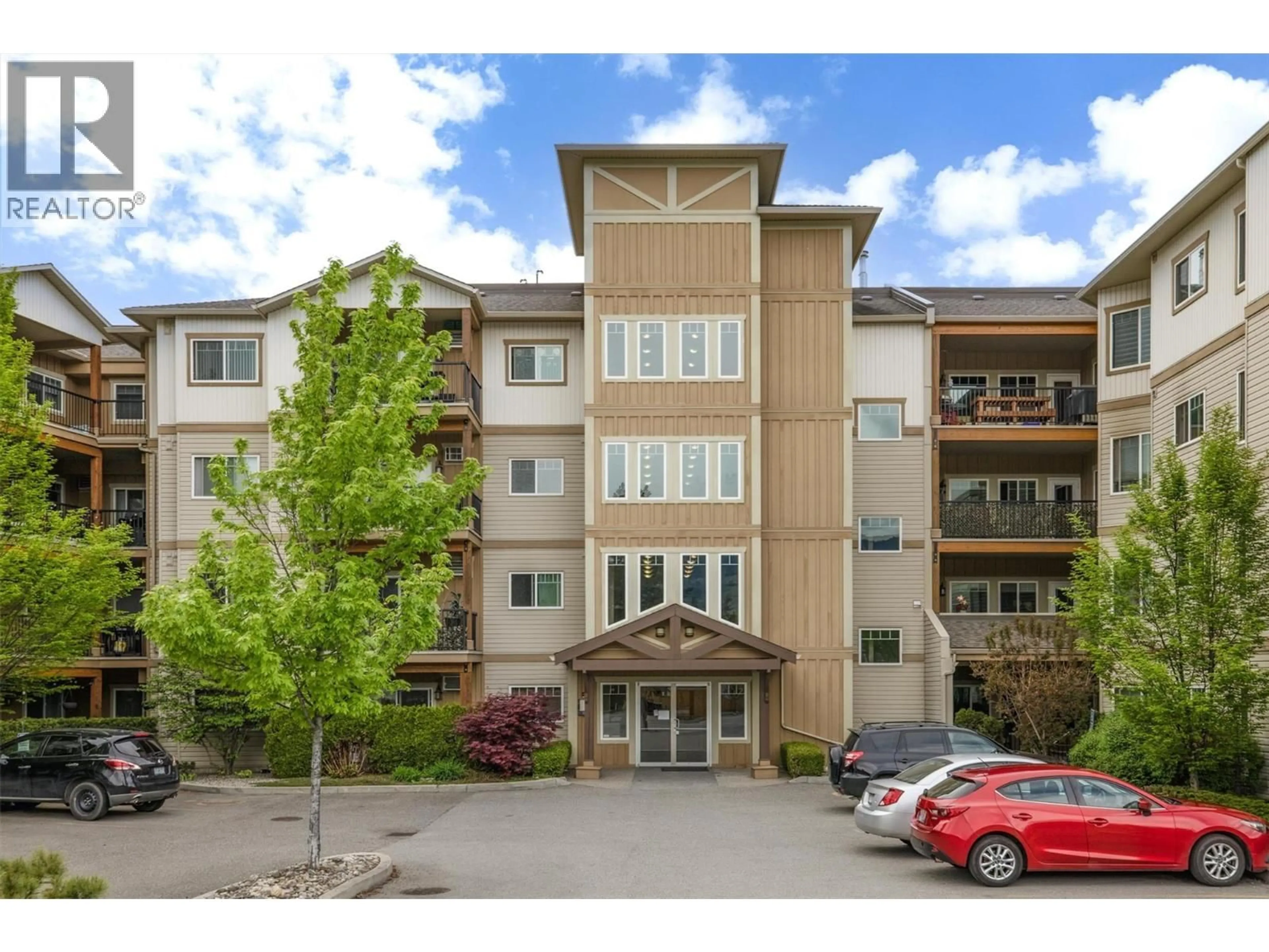 A pic from outside/outdoor area/front of a property/back of a property/a pic from drone, mountain view for 206 - 250 HOLLYWOOD ROAD SOUTH, Kelowna British Columbia V1X3S9