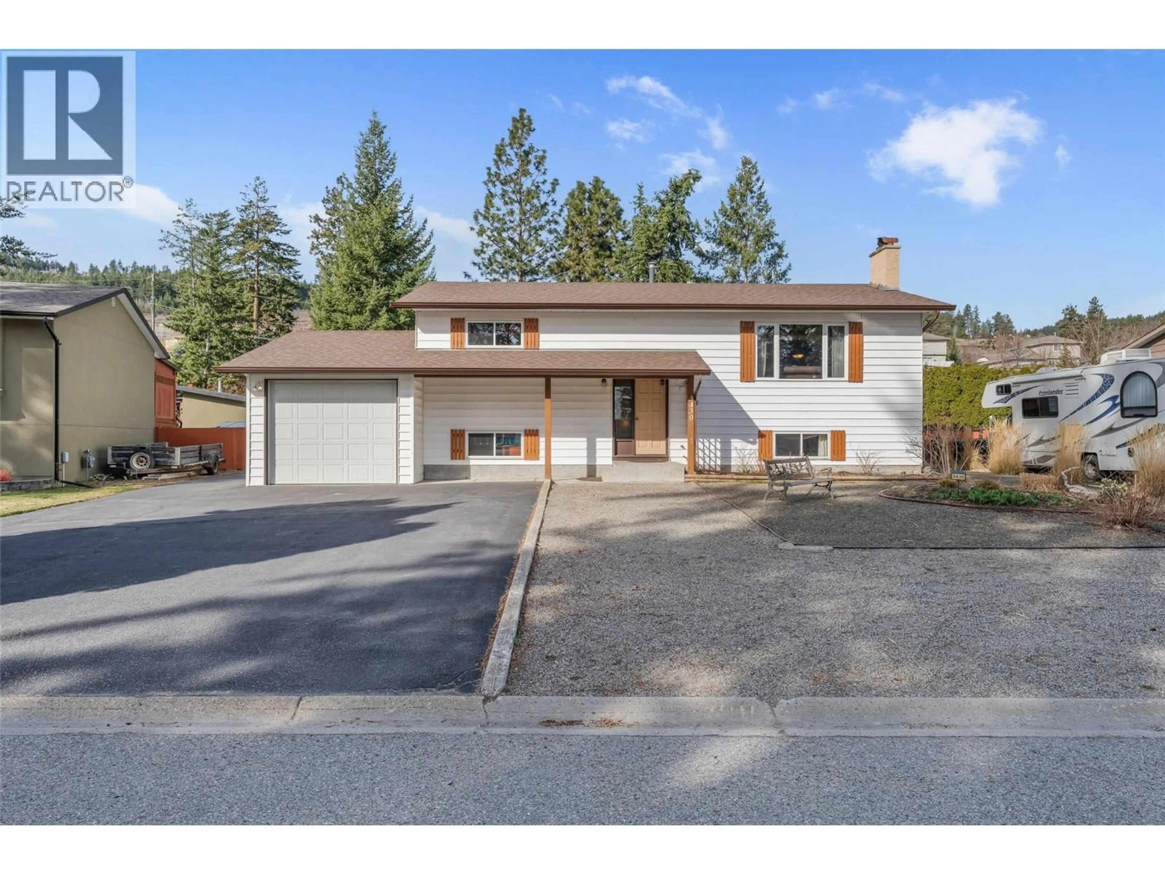 Home with vinyl exterior material, street for 3430 LIARD COURT, West Kelowna British Columbia V4T1B6
