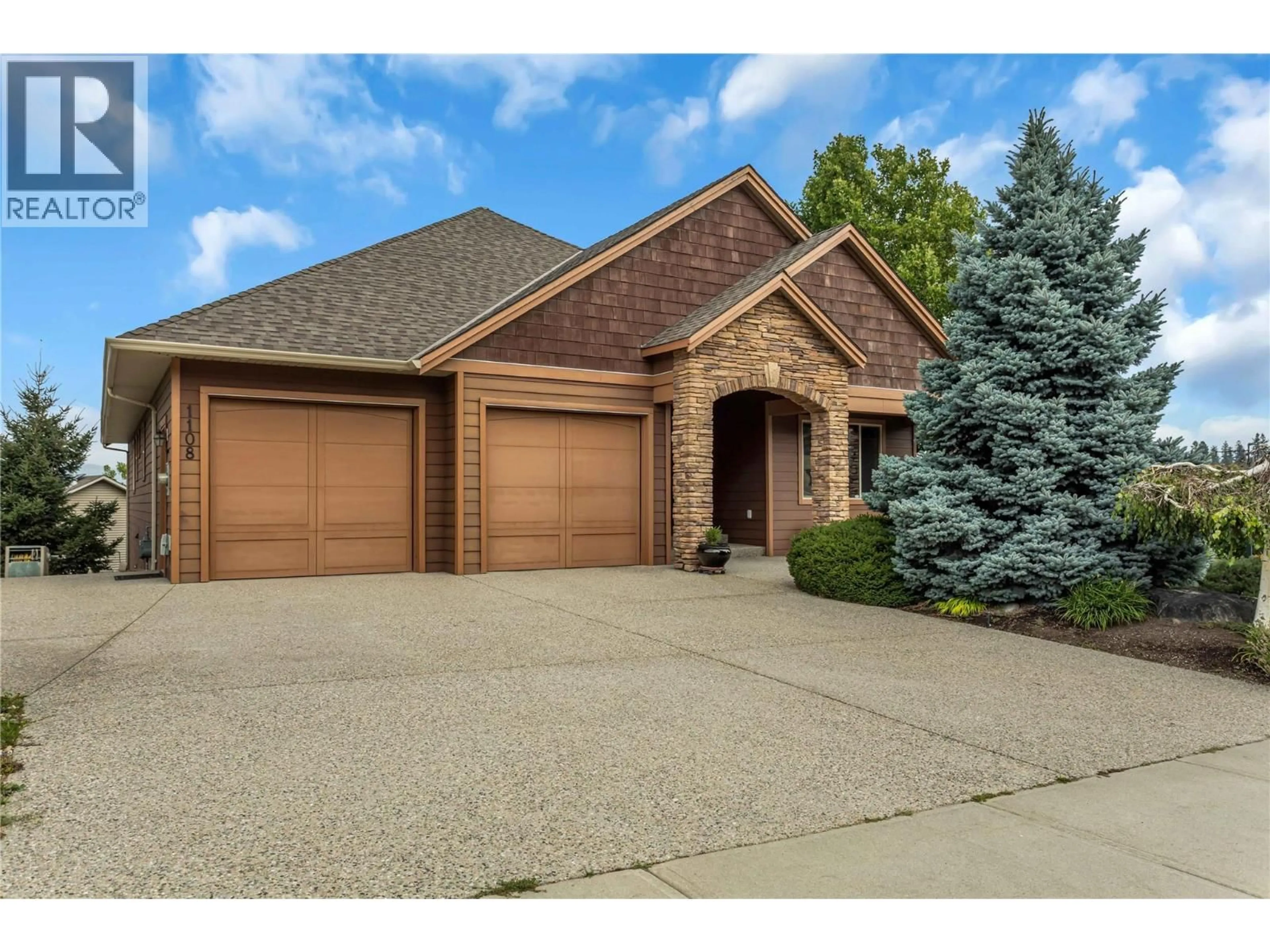 Home with brick exterior material, street for 1108 ARBOR VIEW DRIVE, Kelowna British Columbia V1W4X1