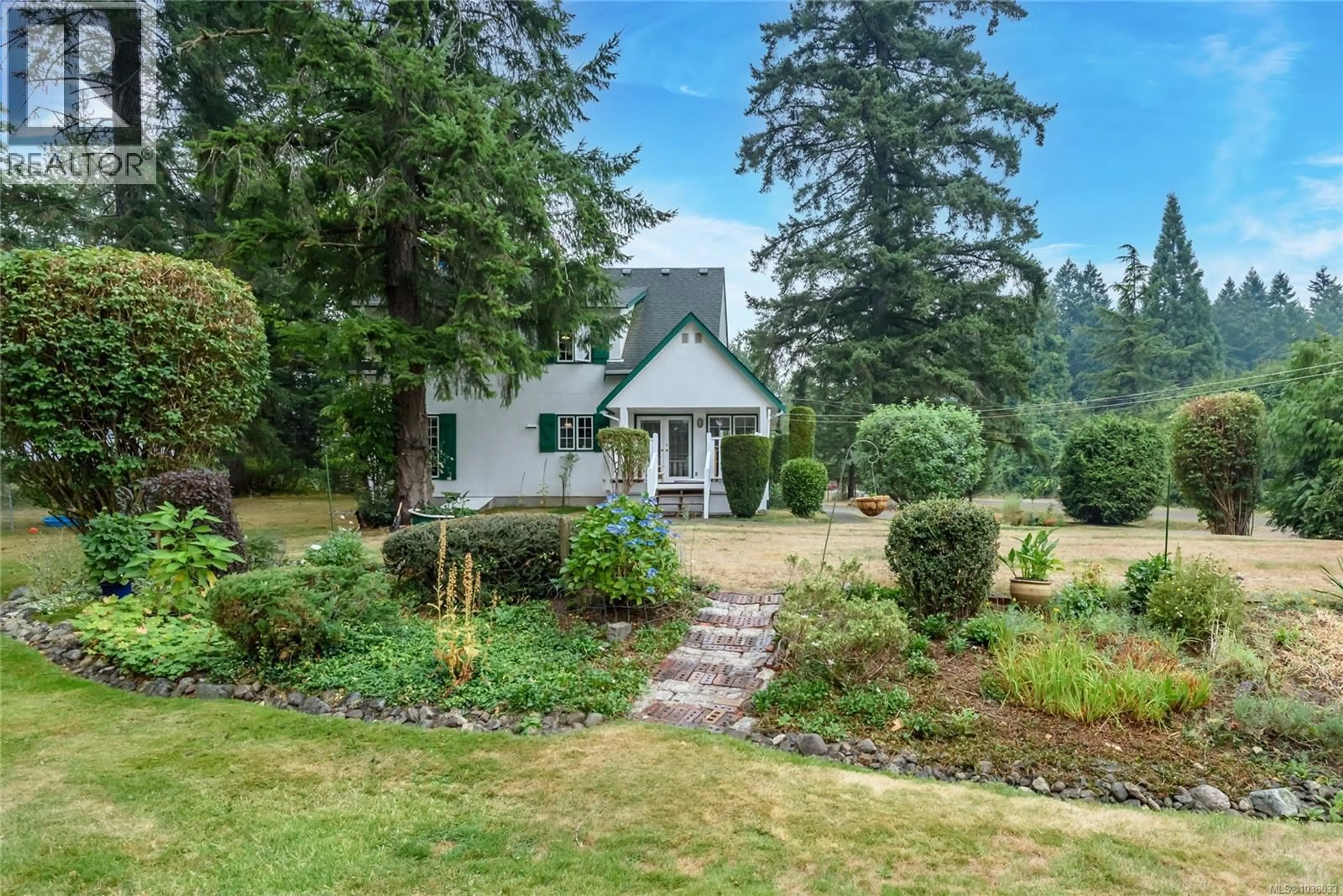 A pic from outside/outdoor area/front of a property/back of a property/a pic from drone, unknown for 2245 SCHULZ ROAD, Black Creek British Columbia V9J1K5