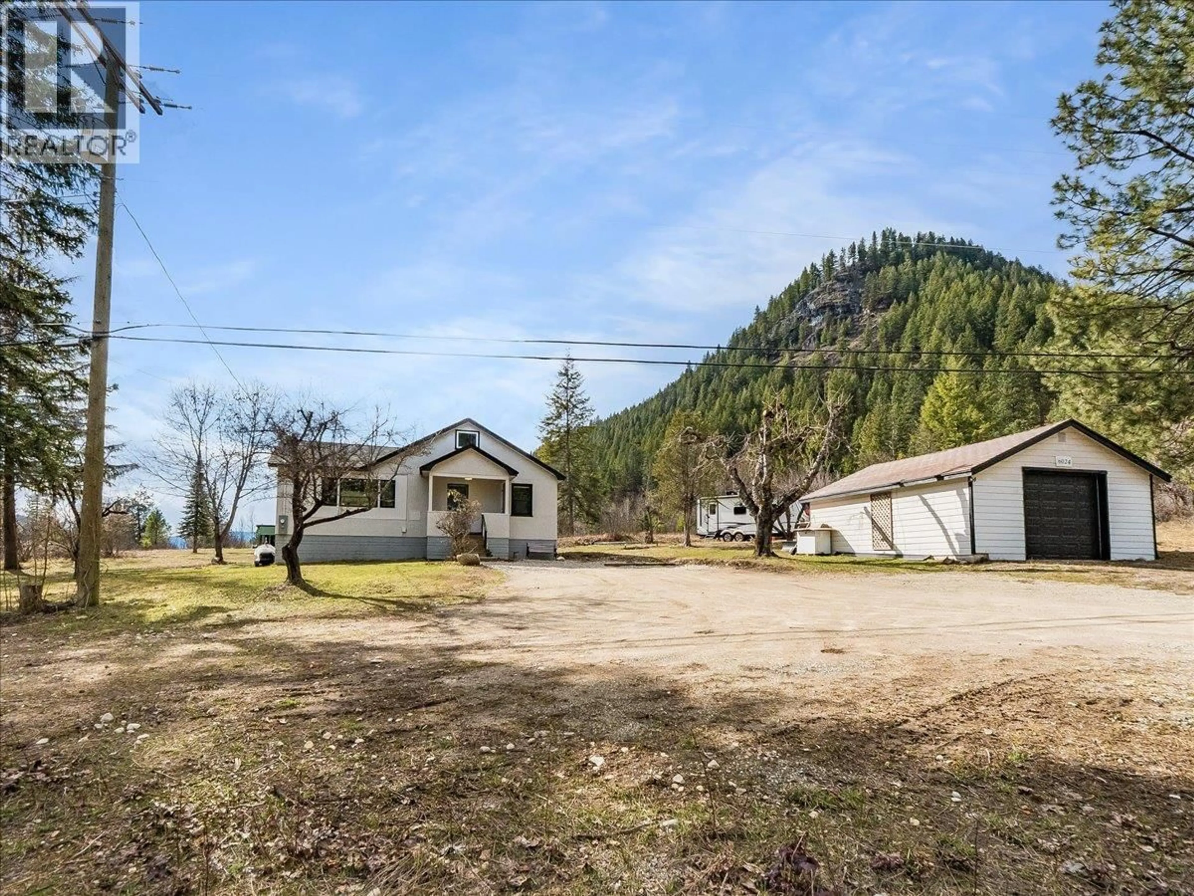 A pic from outside/outdoor area/front of a property/back of a property/a pic from drone, mountain view for 6024 HUTCHINS ROAD, Taghum British Columbia V1L6Y1