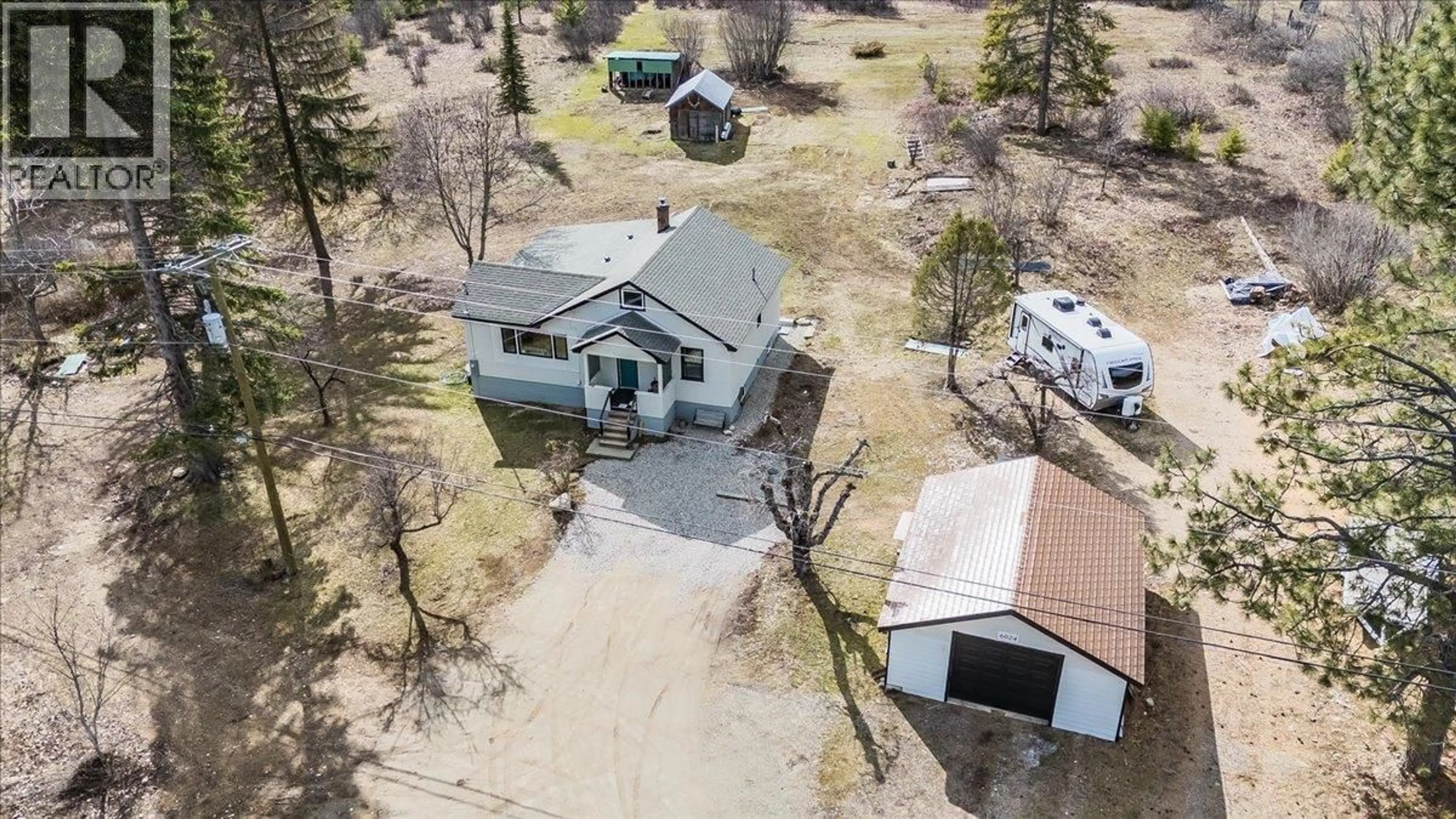 A pic from outside/outdoor area/front of a property/back of a property/a pic from drone, street for 6024 HUTCHINS ROAD, Taghum British Columbia V1L6Y1
