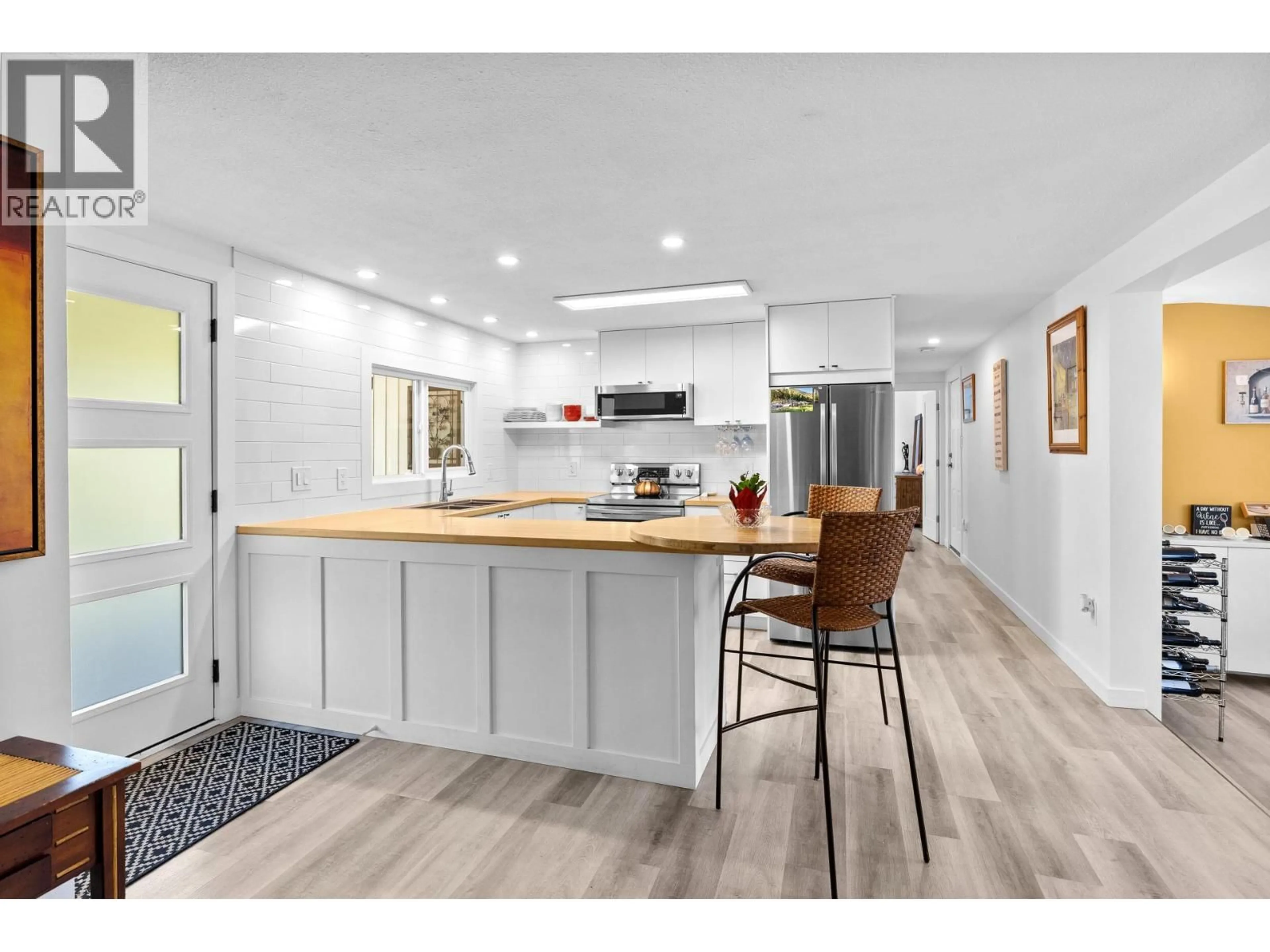 Open concept kitchen, wood/laminate floor for 15 - 3206 SHANNON LAKE ROAD, West Kelowna British Columbia V4T1V4