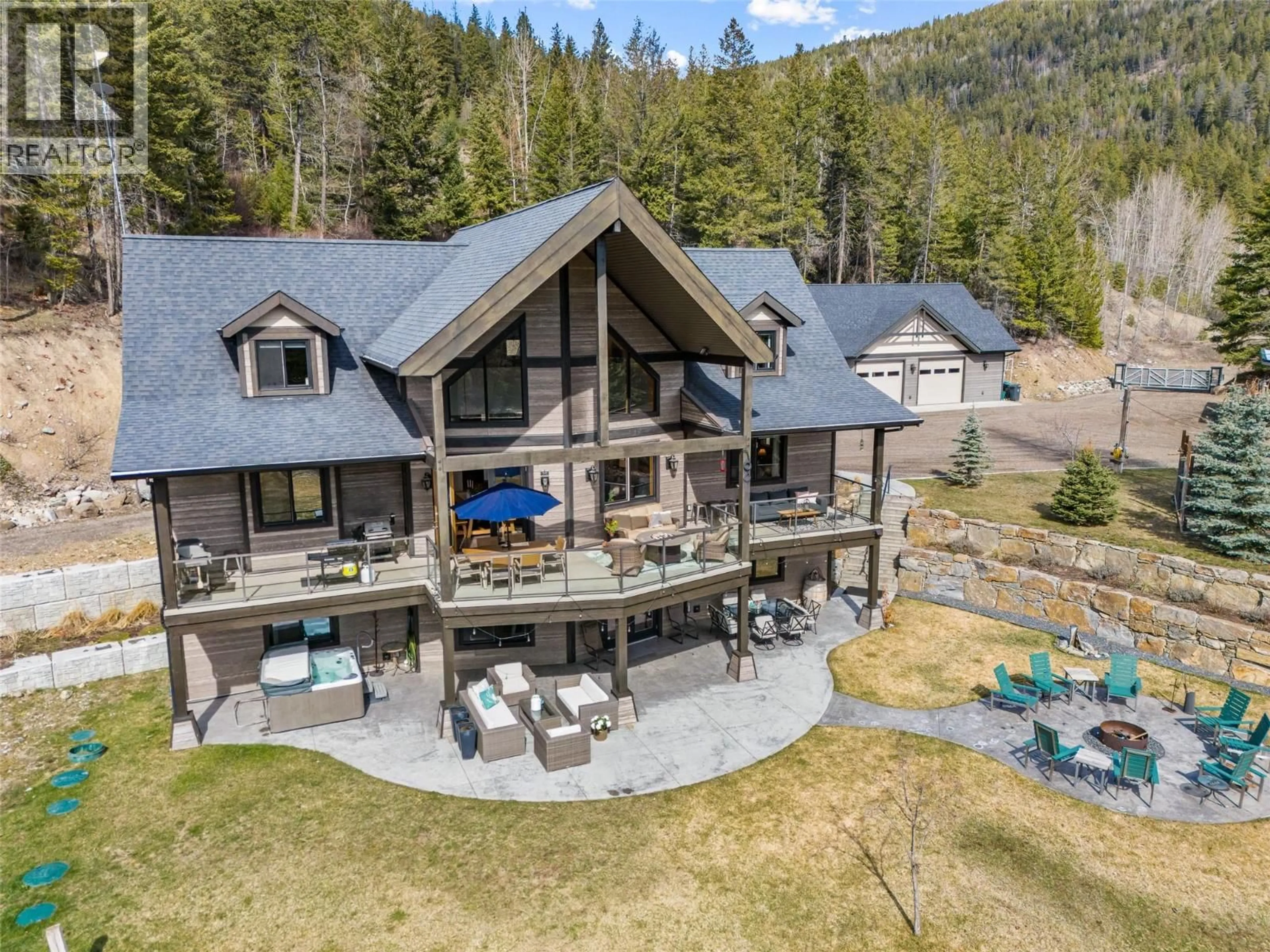 A pic from outside/outdoor area/front of a property/back of a property/a pic from drone, mountain view for 1898 CARDINAL CREEK ROAD, Kelowna British Columbia V1P1J3