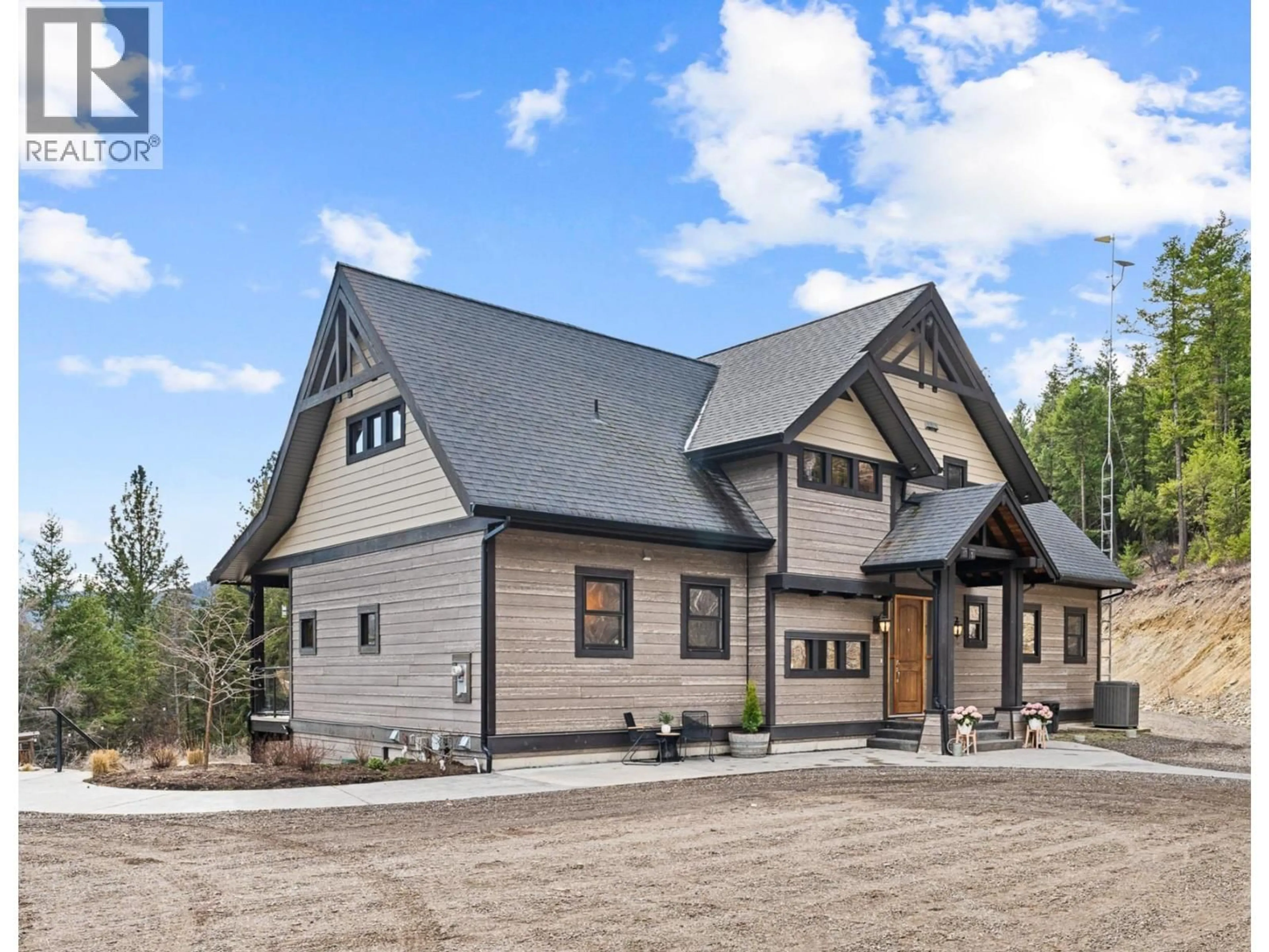 Home with vinyl exterior material, mountain view for 1898 CARDINAL CREEK ROAD, Kelowna British Columbia V1P1J3